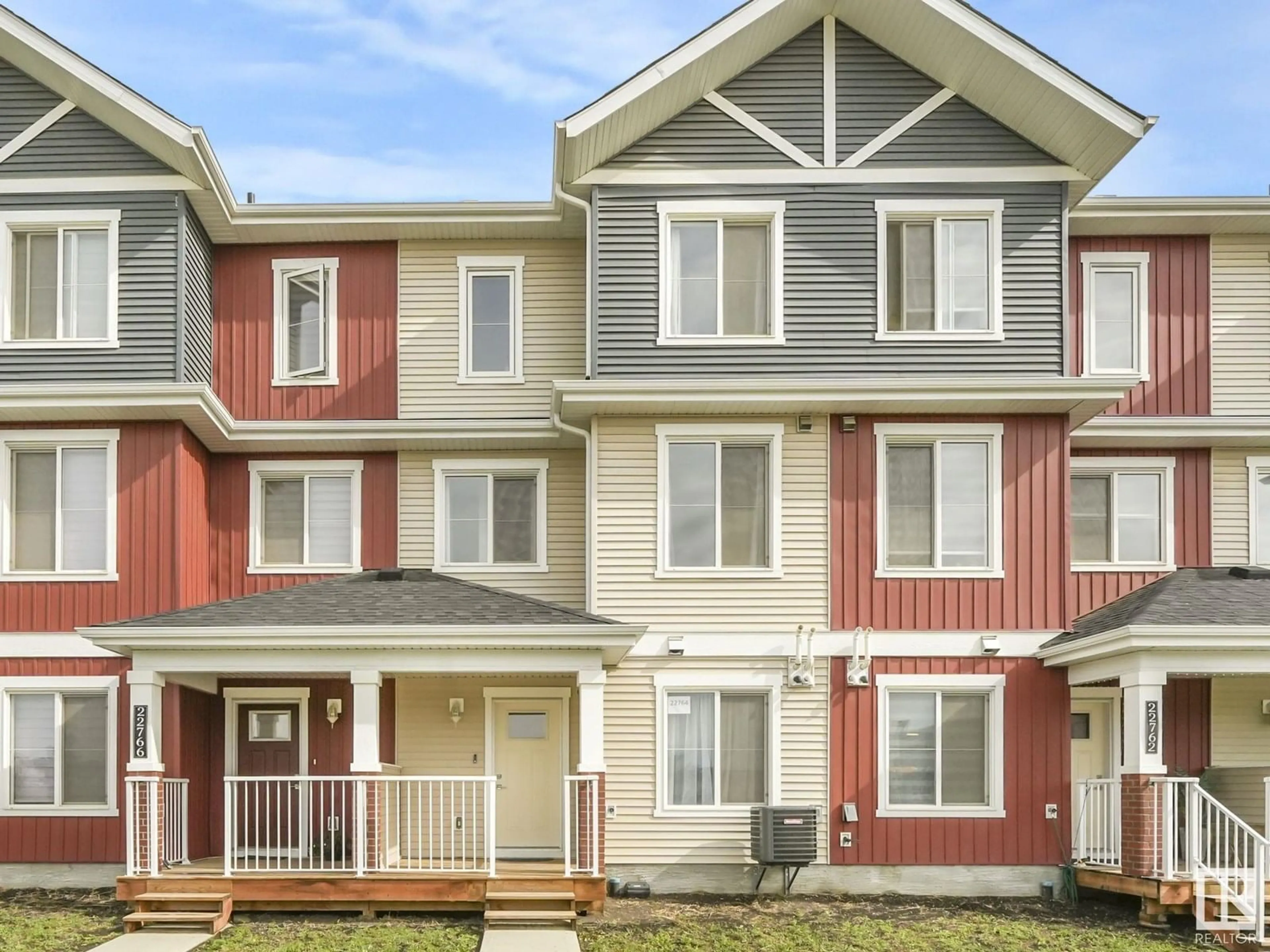 Home with vinyl exterior material, street for NW - 22764 97 AV, Edmonton Alberta T5T7S6
