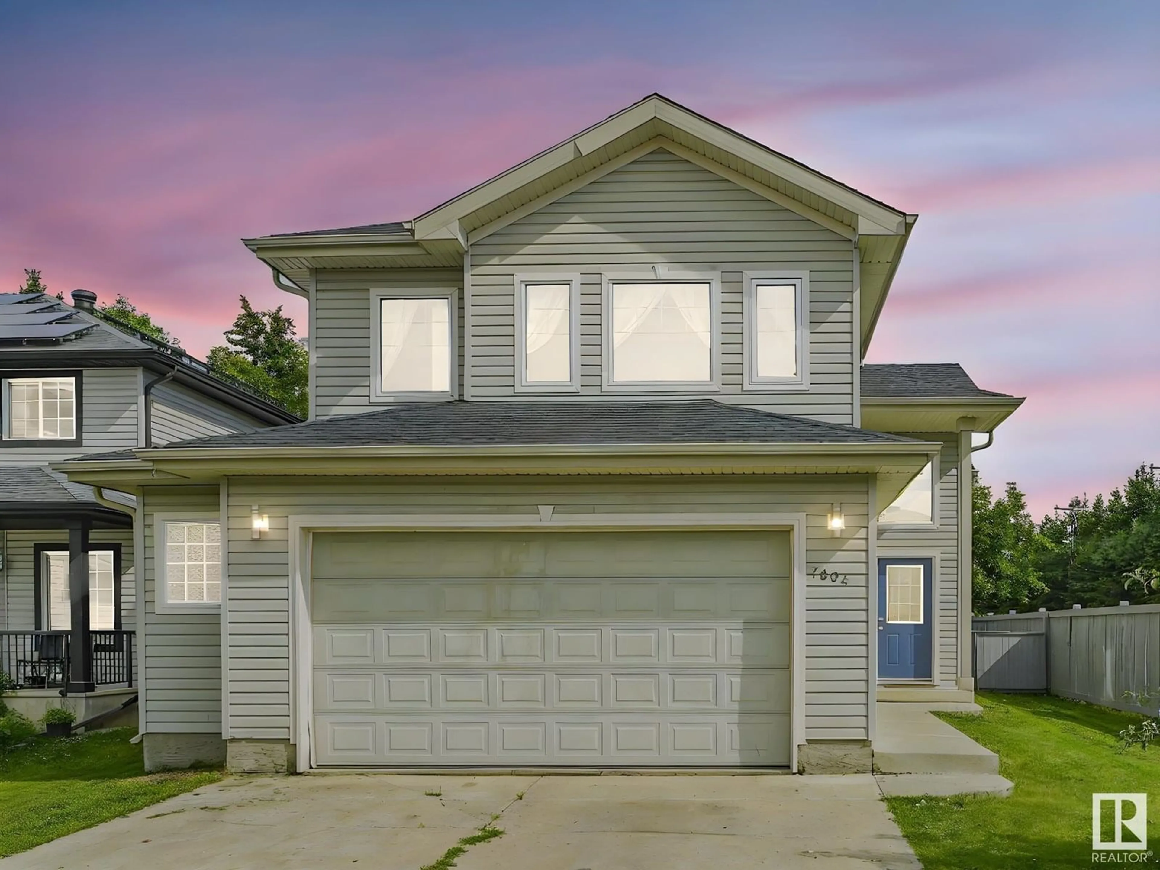 Home with vinyl exterior material, street for 7804 5 AV SW, Edmonton Alberta T6X0A1