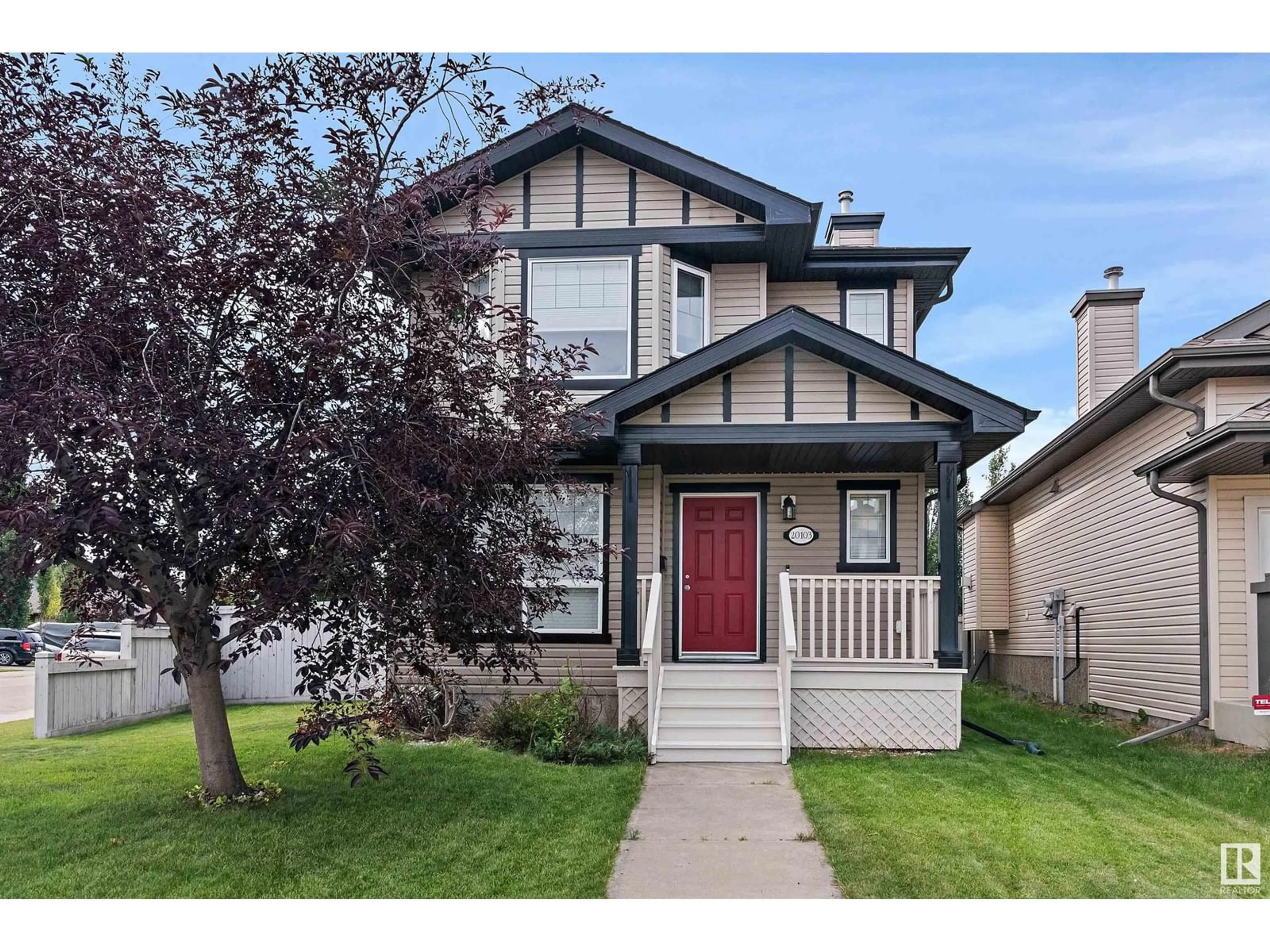 Home with vinyl exterior material, street for NW - 20103 58 AV, Edmonton Alberta T6M0B4