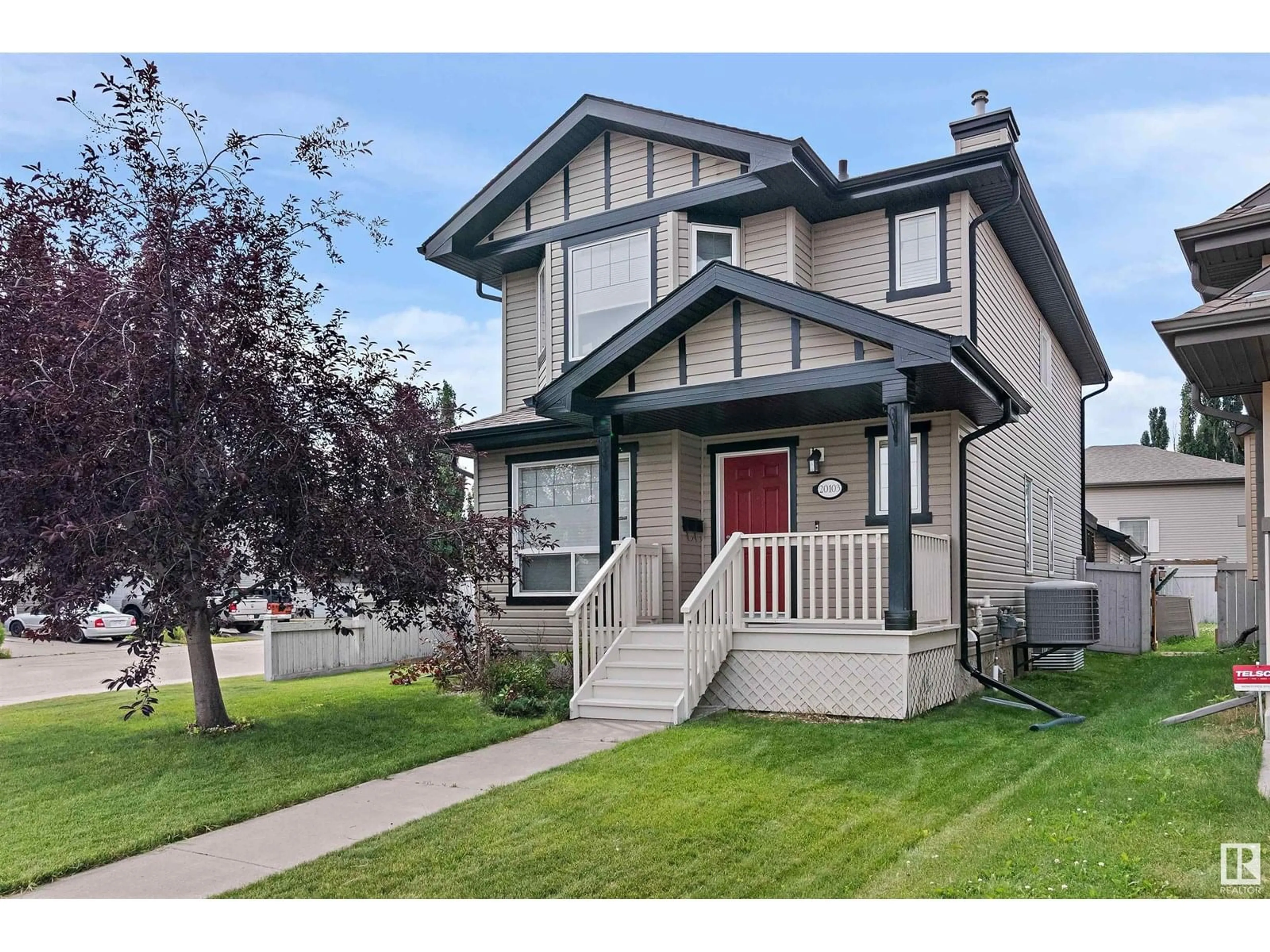 Home with vinyl exterior material, street for NW - 20103 58 AV, Edmonton Alberta T6M0B4
