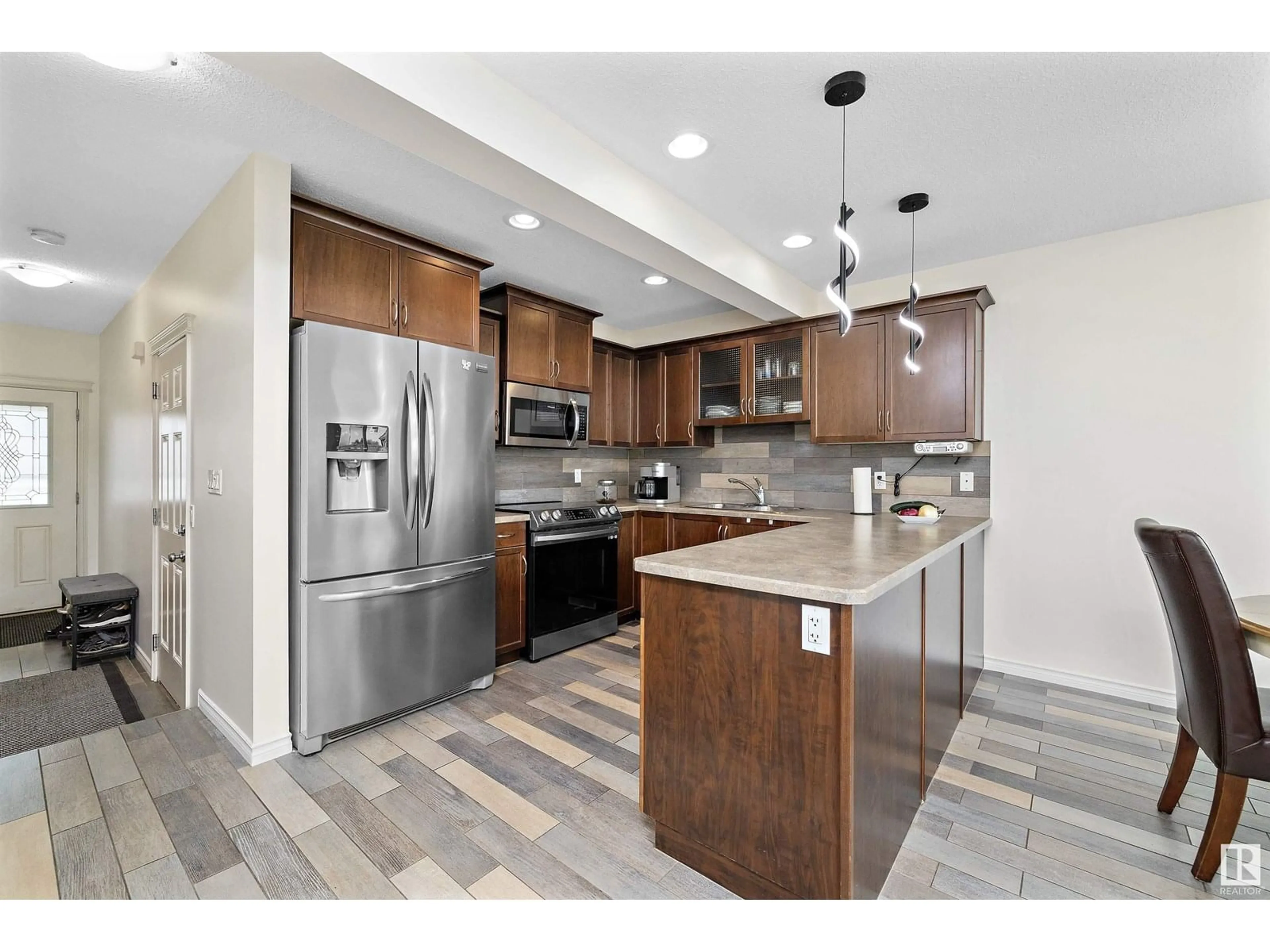 Open concept kitchen, ceramic/tile floor for 21304 46 AV, Edmonton Alberta T6M0G9