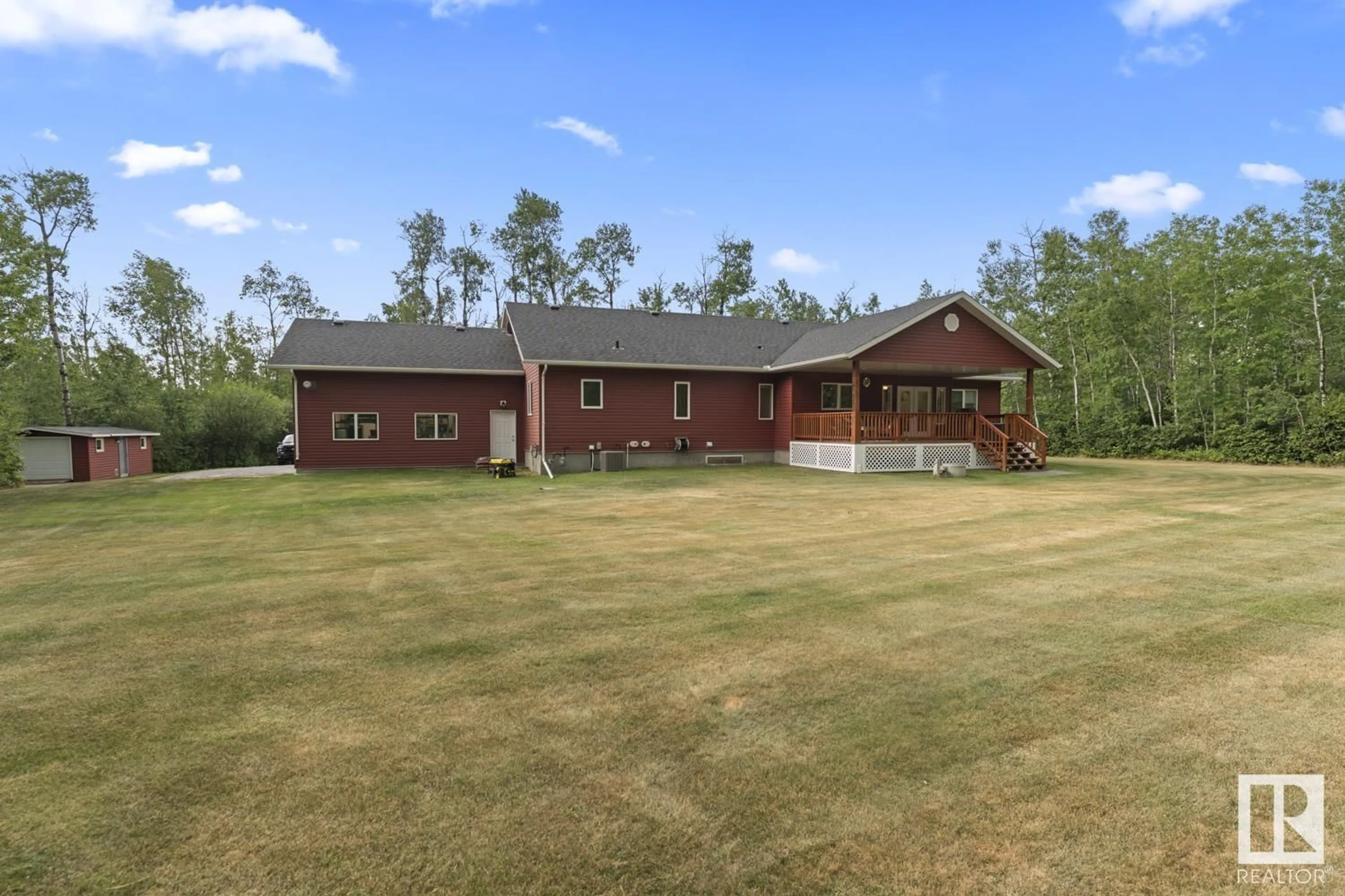 A pic from outside/outdoor area/front of a property/back of a property/a pic from drone, building for 8 - 63220 RR 433, Rural Bonnyville M.D. Alberta T9M1P2