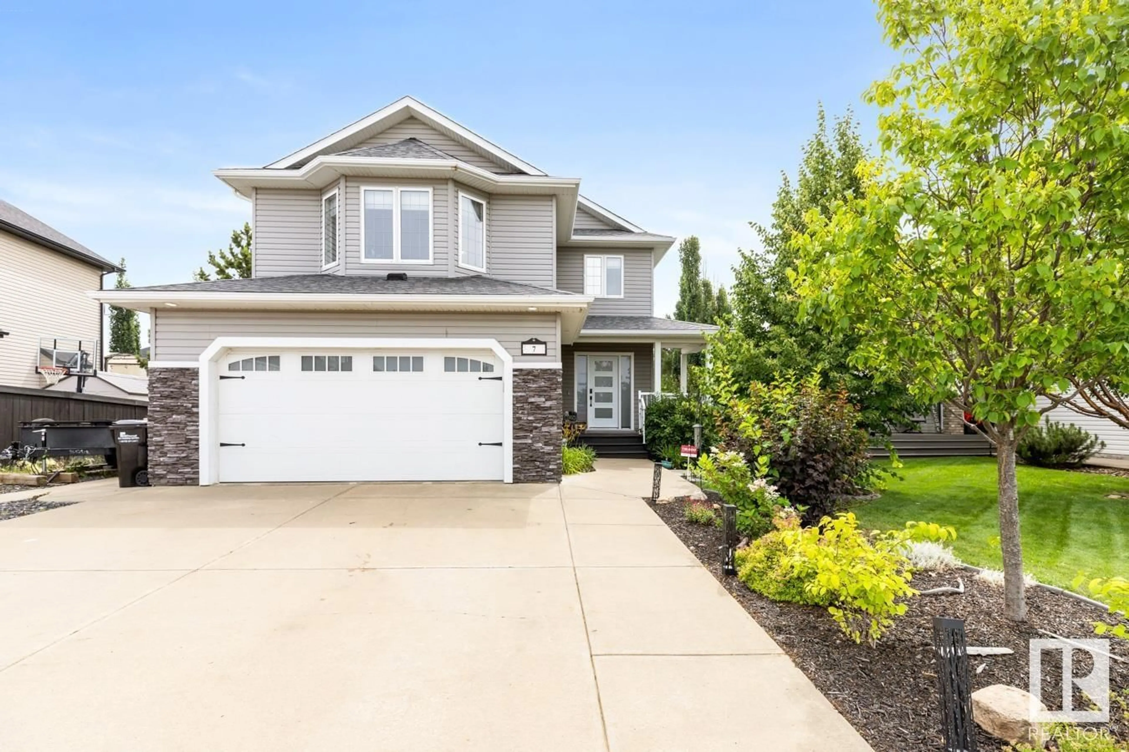 Home with vinyl exterior material, street for 7 CREEKSIDE DR, Ardrossan Alberta T8E1J6