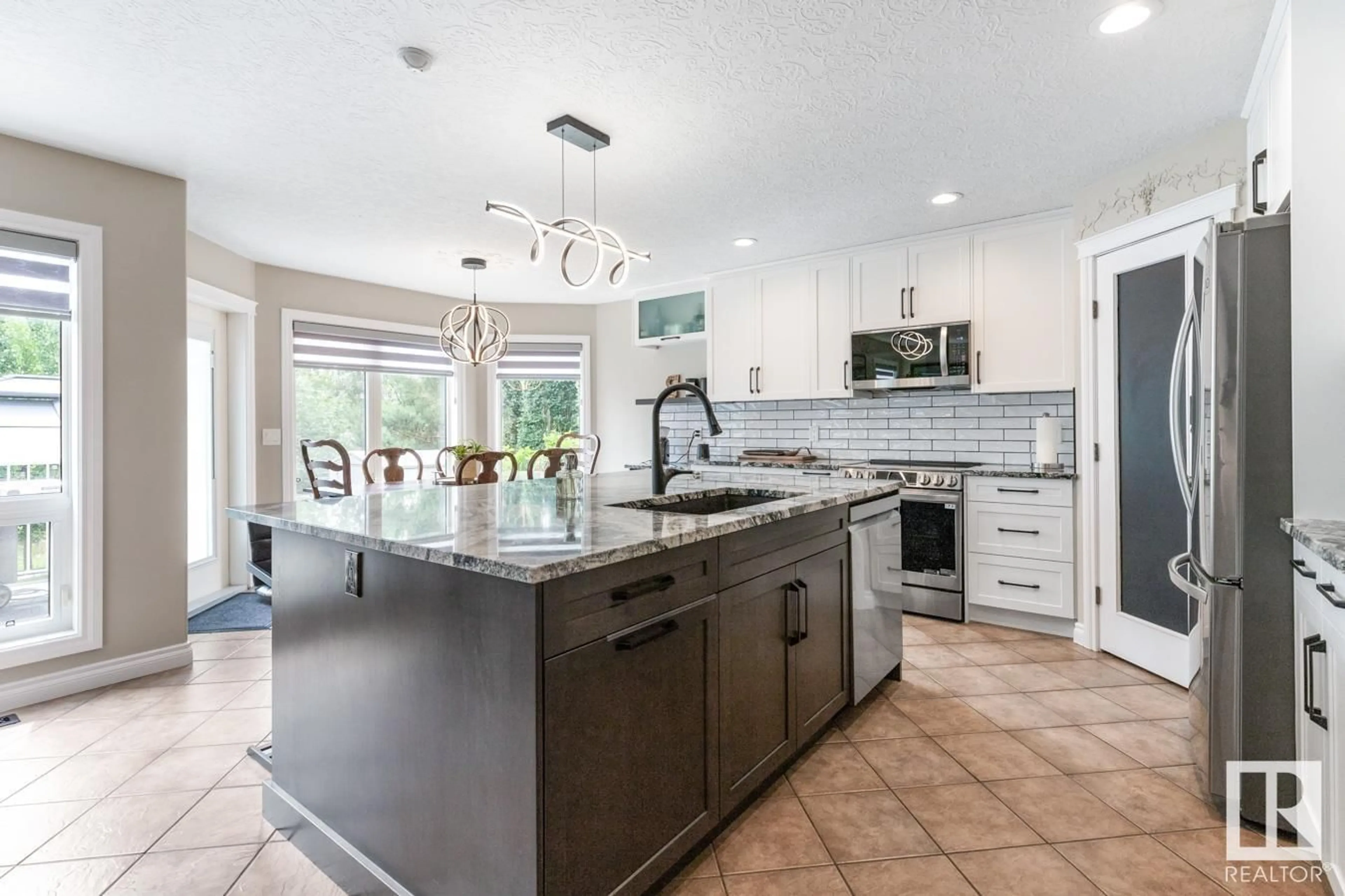 Open concept kitchen, ceramic/tile floor for 7 CREEKSIDE DR, Ardrossan Alberta T8E1J6