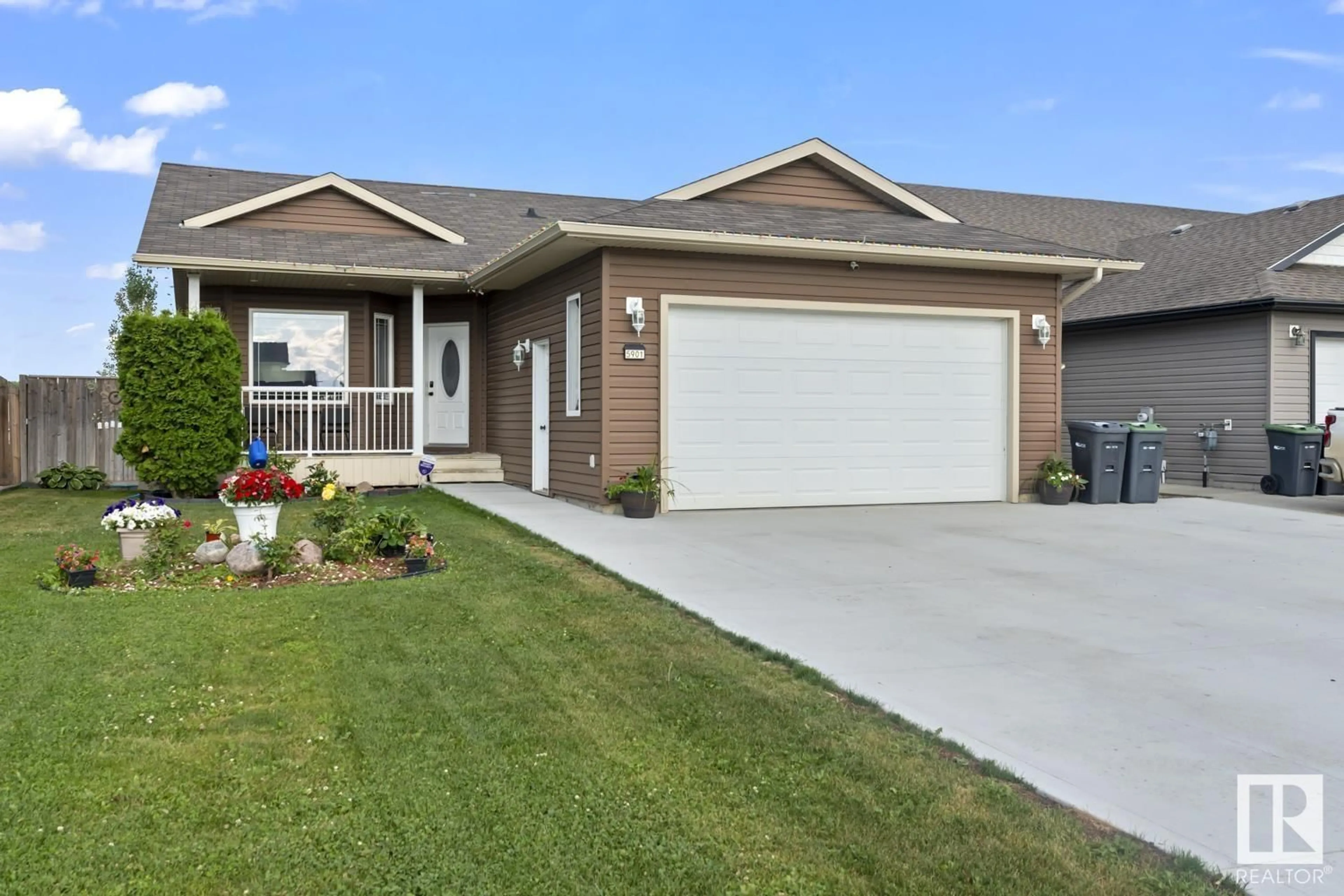 Home with vinyl exterior material, street for 5901 49 ST, Cold Lake Alberta T9M0C1