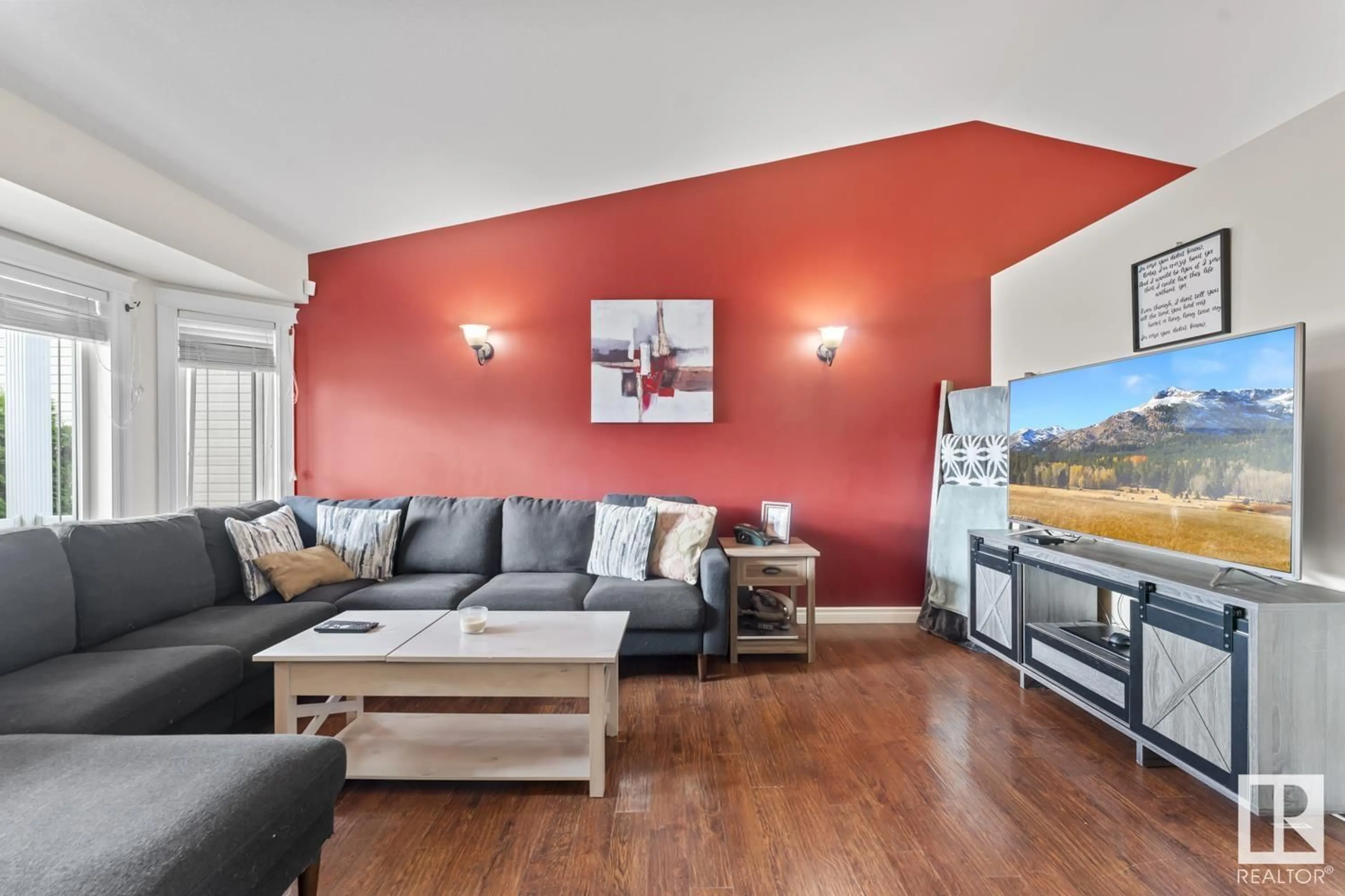 Living room with furniture, wood/laminate floor for 5901 49 ST, Cold Lake Alberta T9M0C1