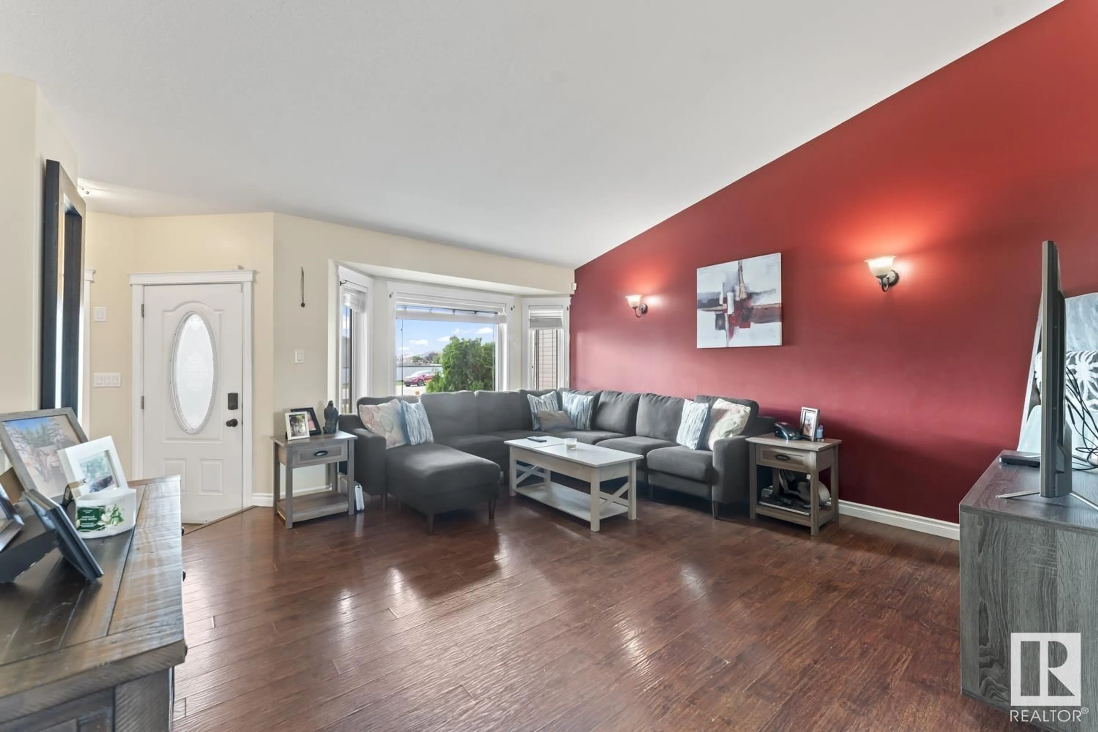 Living room with furniture, wood/laminate floor for 5901 49 ST, Cold Lake Alberta T9M0C1