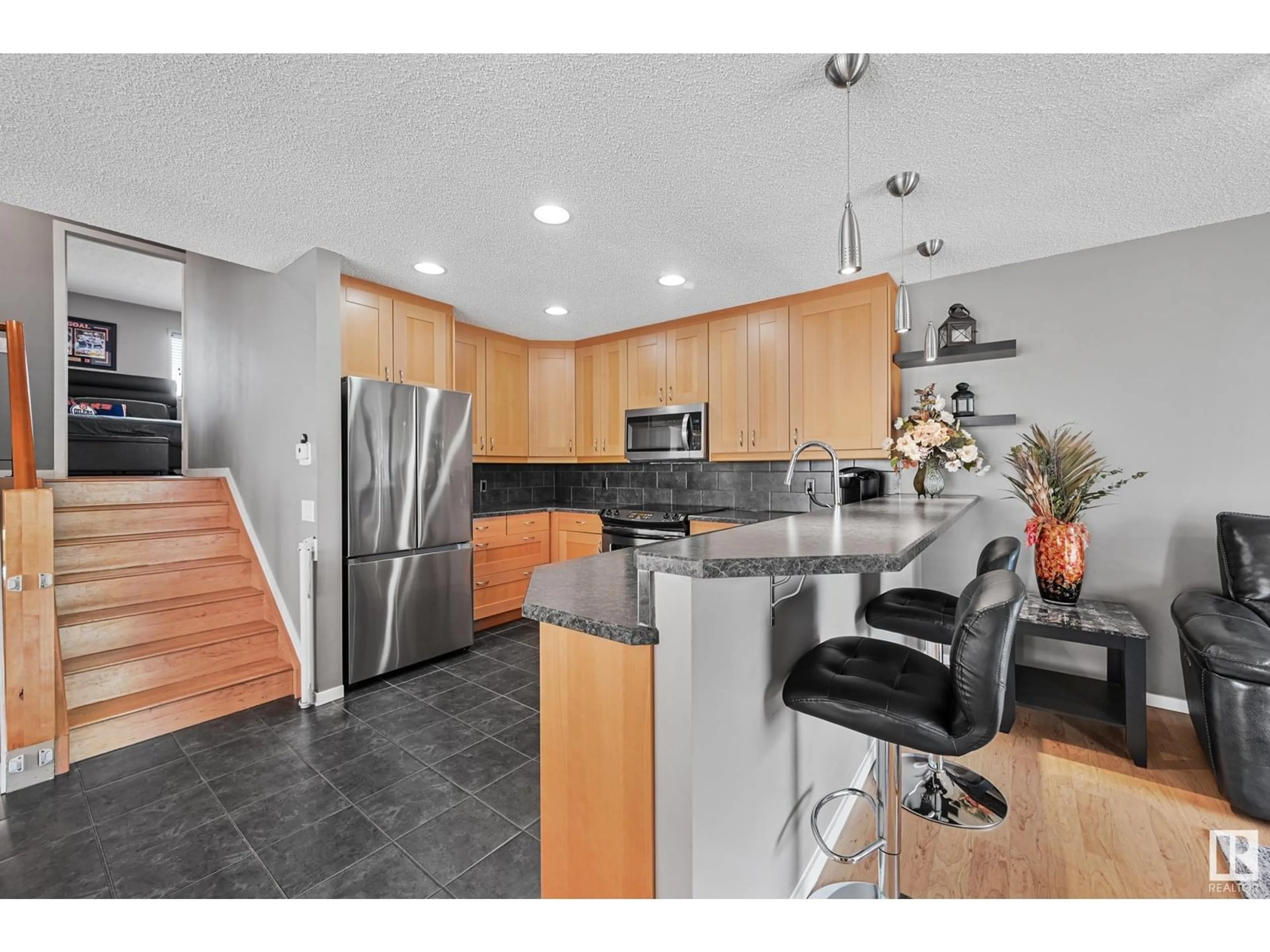 Open concept kitchen, ceramic/tile floor for 193 HYNDMAN CR, Edmonton Alberta T5A4X6