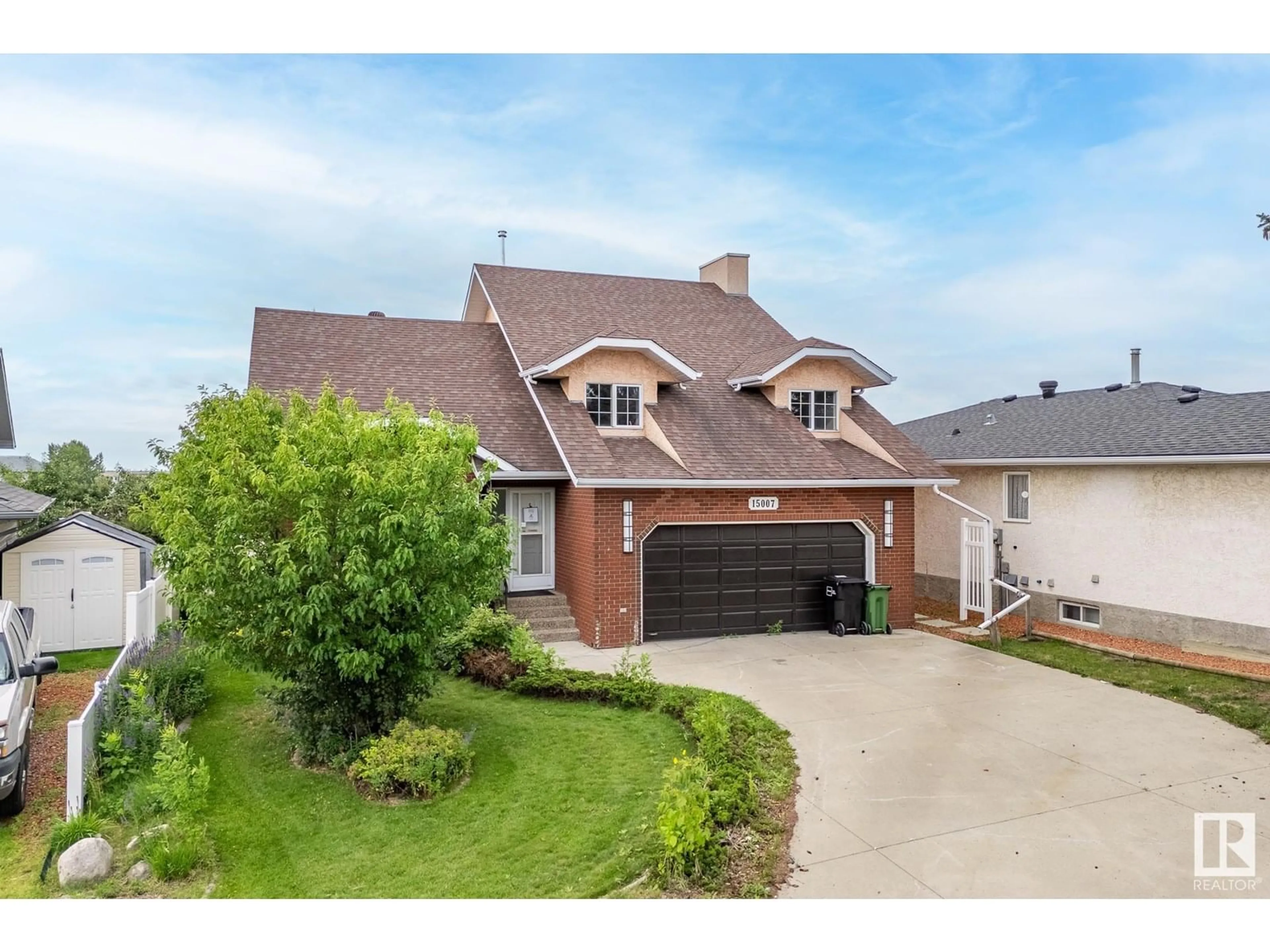 Home with brick exterior material, street for 15007 51 ST, Edmonton Alberta T5A4X3