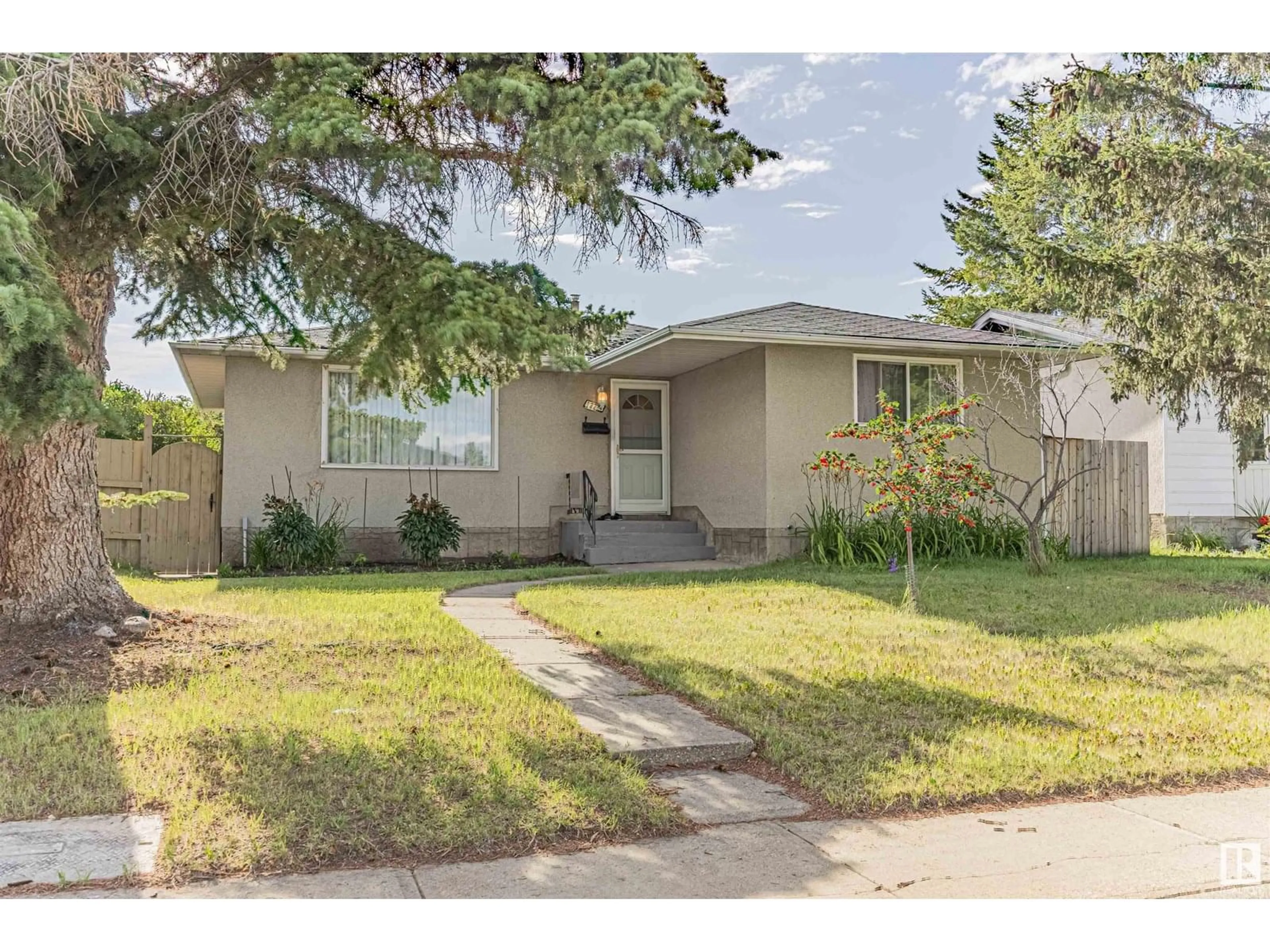 Home with vinyl exterior material, street for NW - 14424 65 ST, Edmonton Alberta T5A2E7