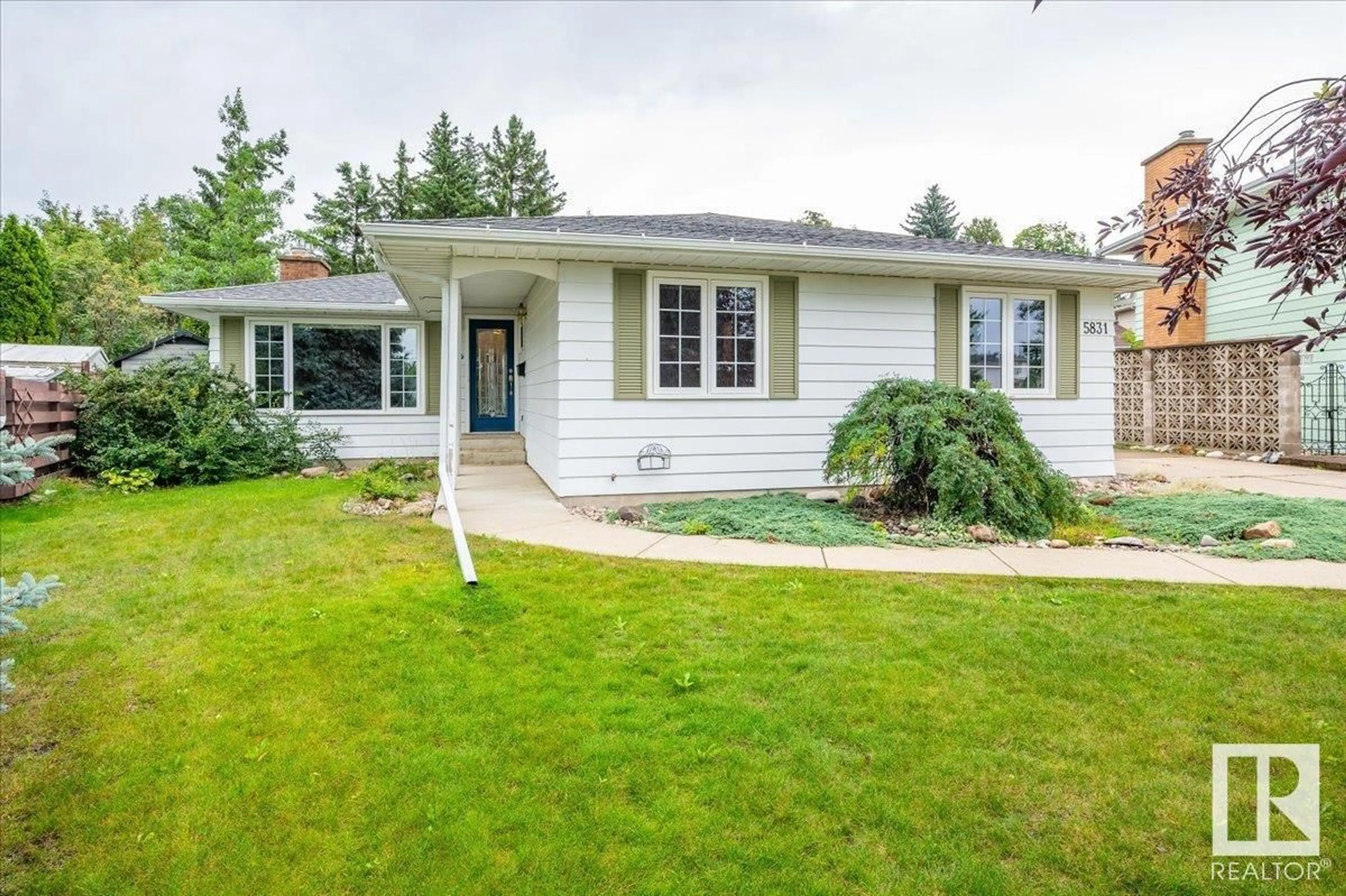 Home with vinyl exterior material, street for 5831 143A ST, Edmonton Alberta T6H4G4