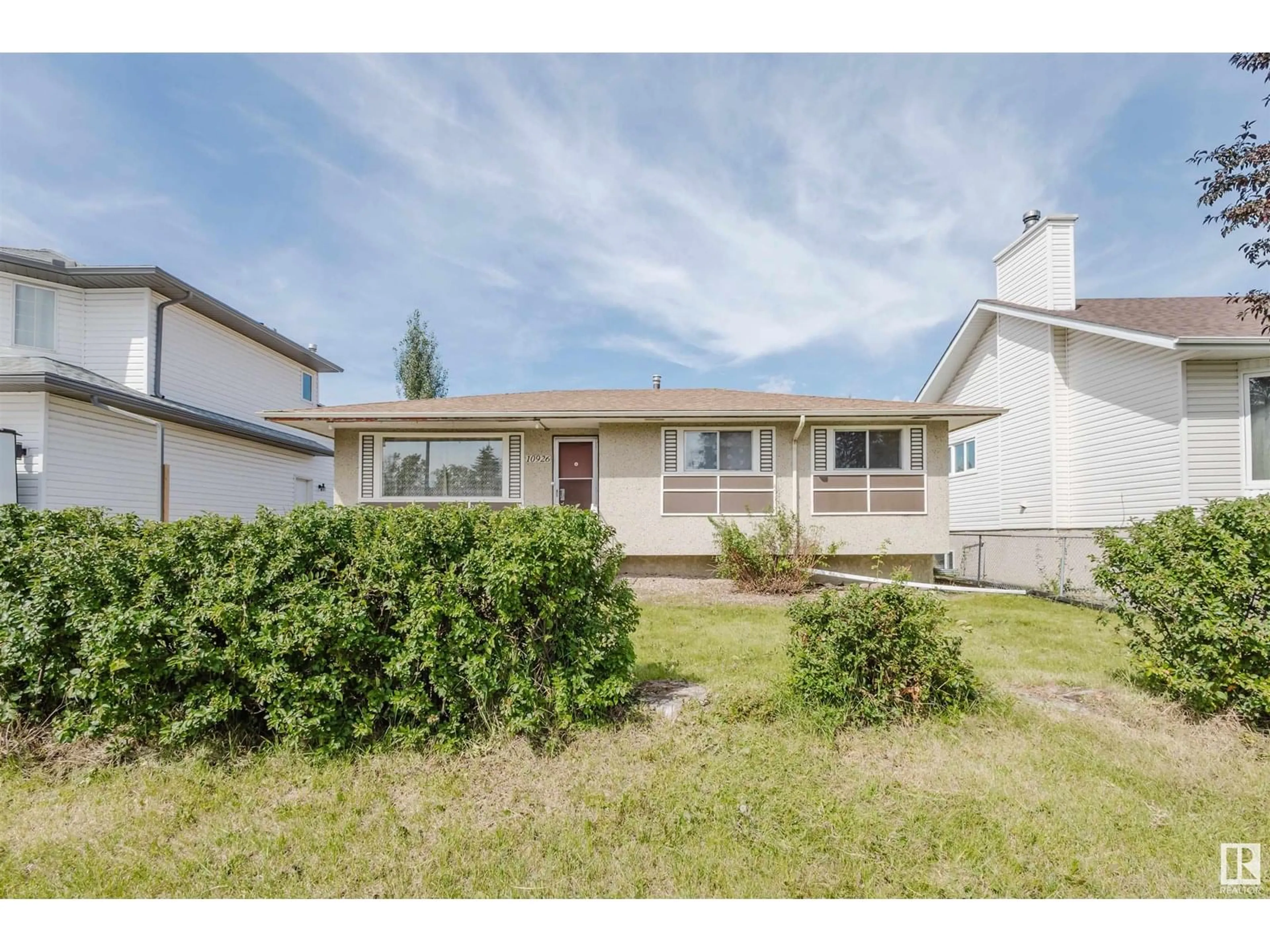 Home with vinyl exterior material, street for NW - 10926 153 ST, Edmonton Alberta T5P2E2
