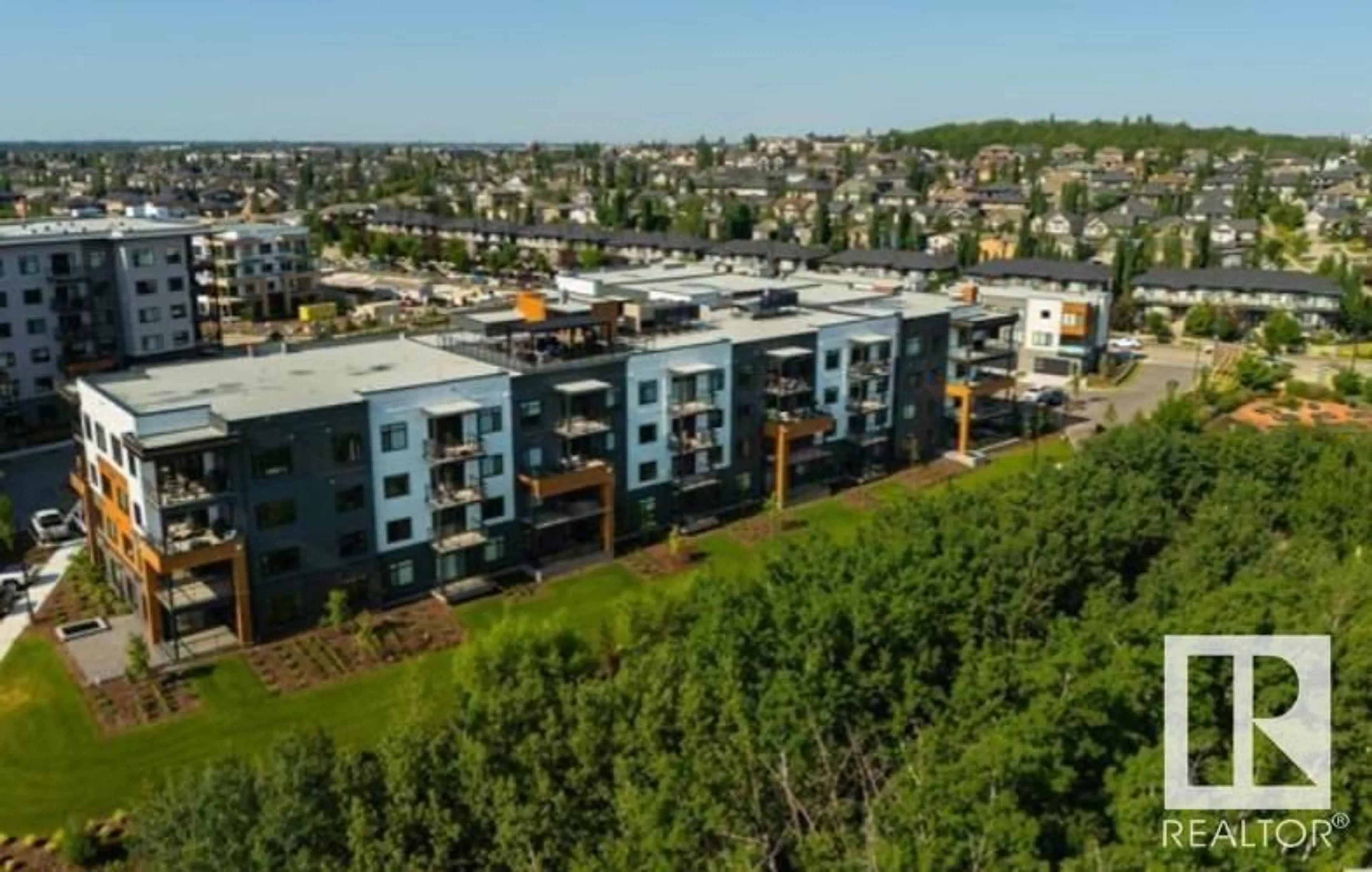 A pic from outside/outdoor area/front of a property/back of a property/a pic from drone, unknown for 7471 - 315 MAY COMMON NW, Edmonton Alberta T6R0X5
