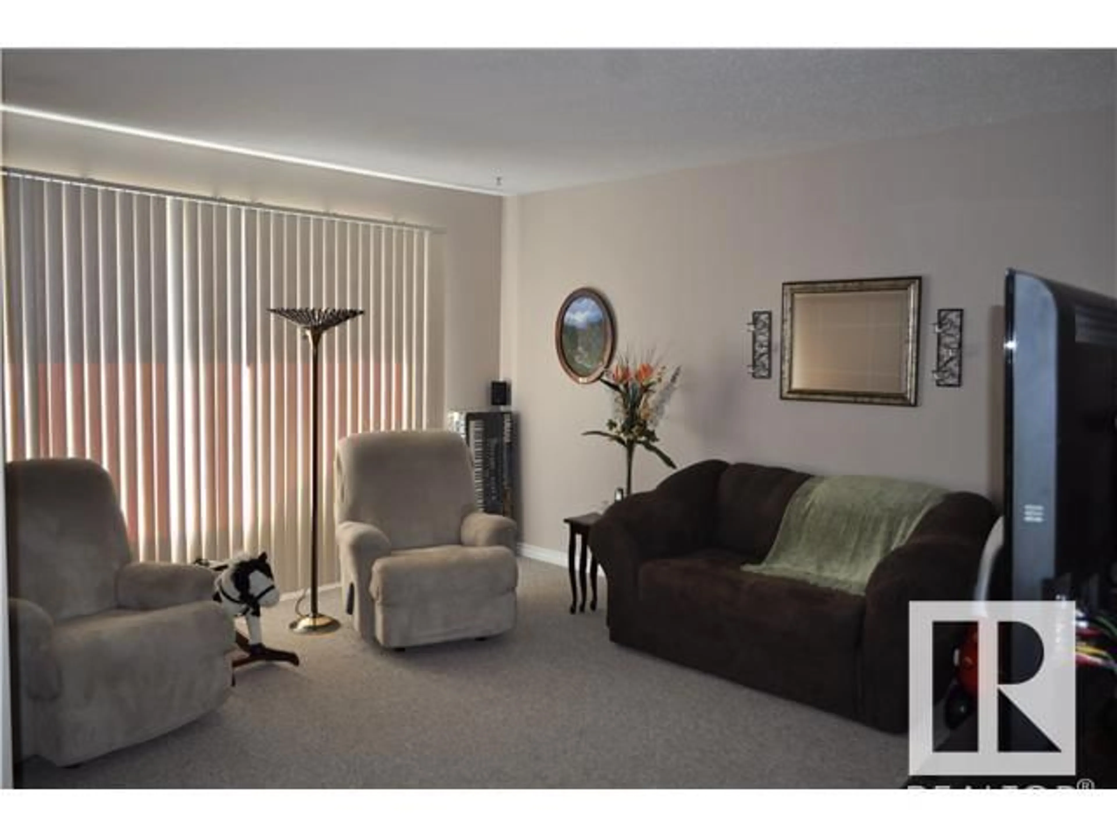 Living room with furniture, unknown for 6706 19 AV, Edmonton Alberta T6K2G8