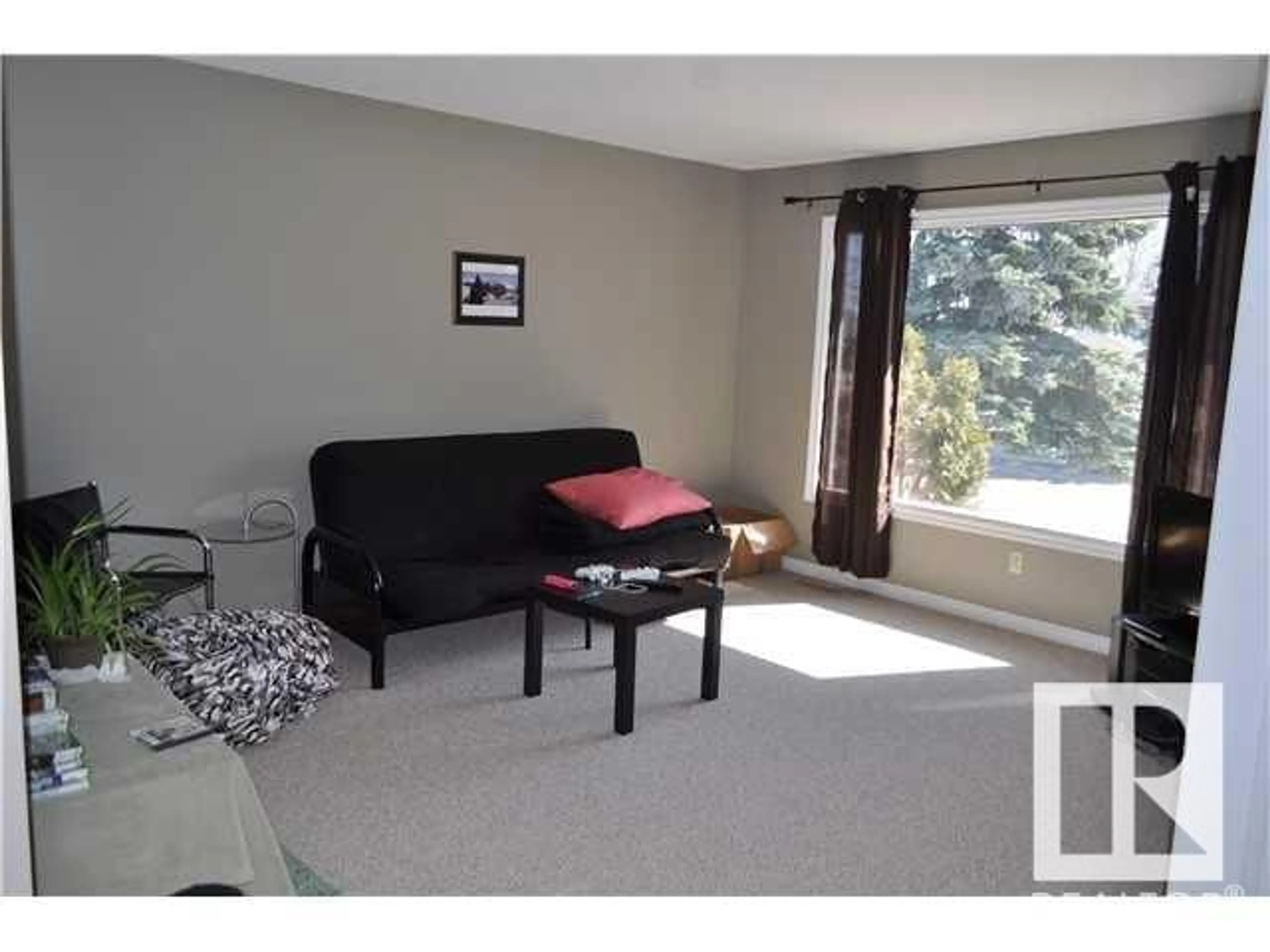 Living room with furniture, unknown for 6706 19 AV, Edmonton Alberta T6K2G8