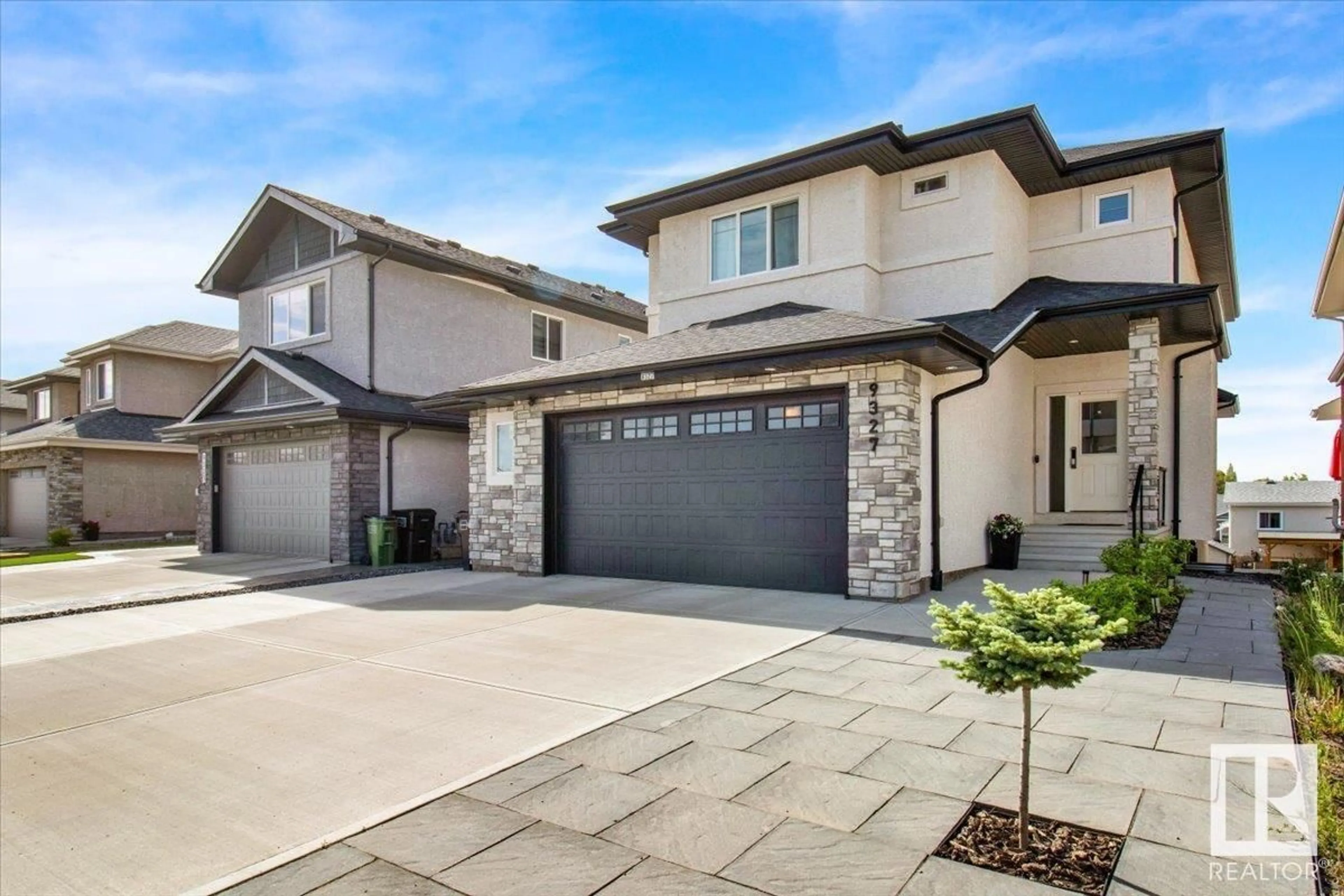 Home with brick exterior material, street for 9327 181 AV, Edmonton Alberta T5Z0K2