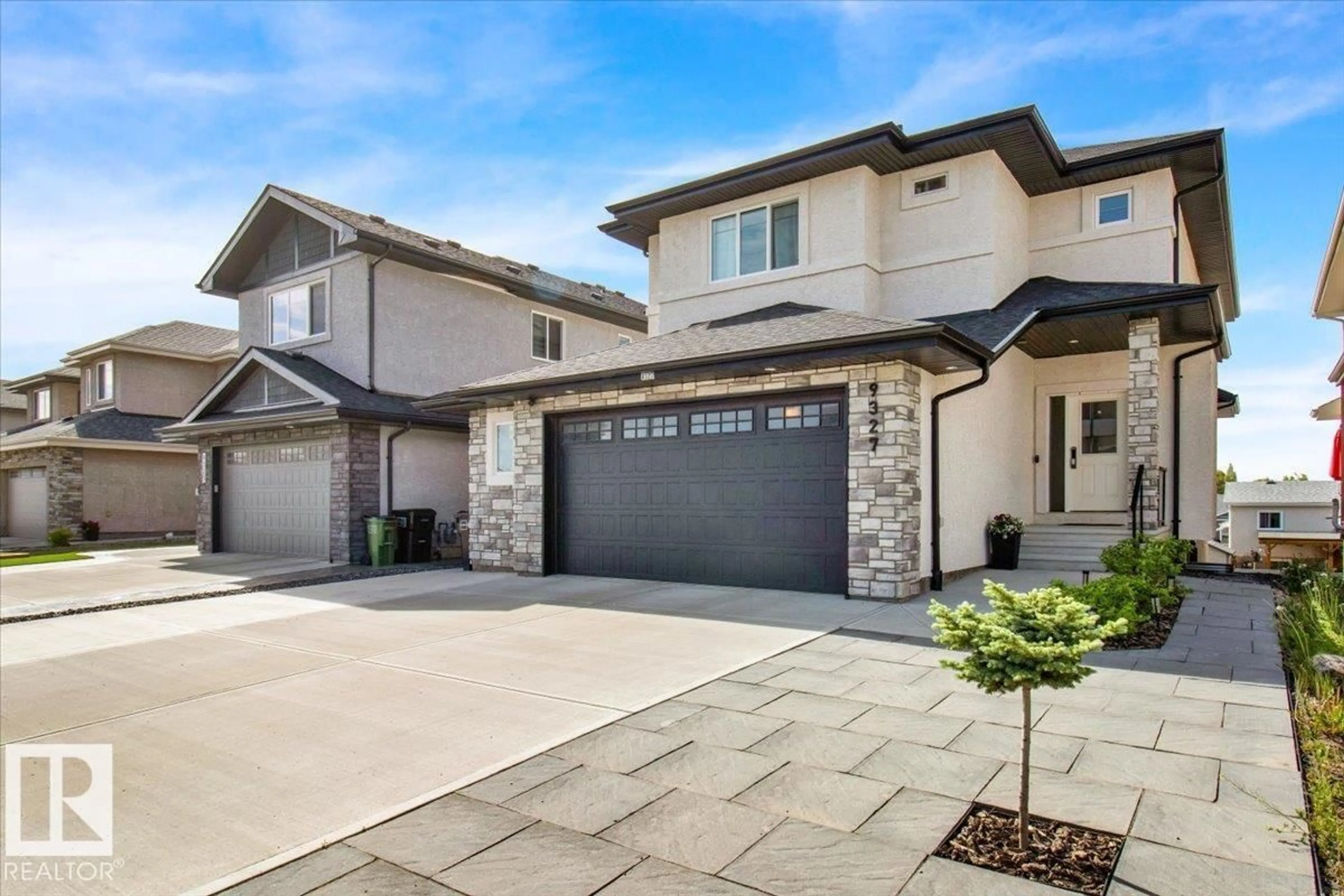 Home with brick exterior material, street for 9327 181 AV, Edmonton Alberta T5Z0K2