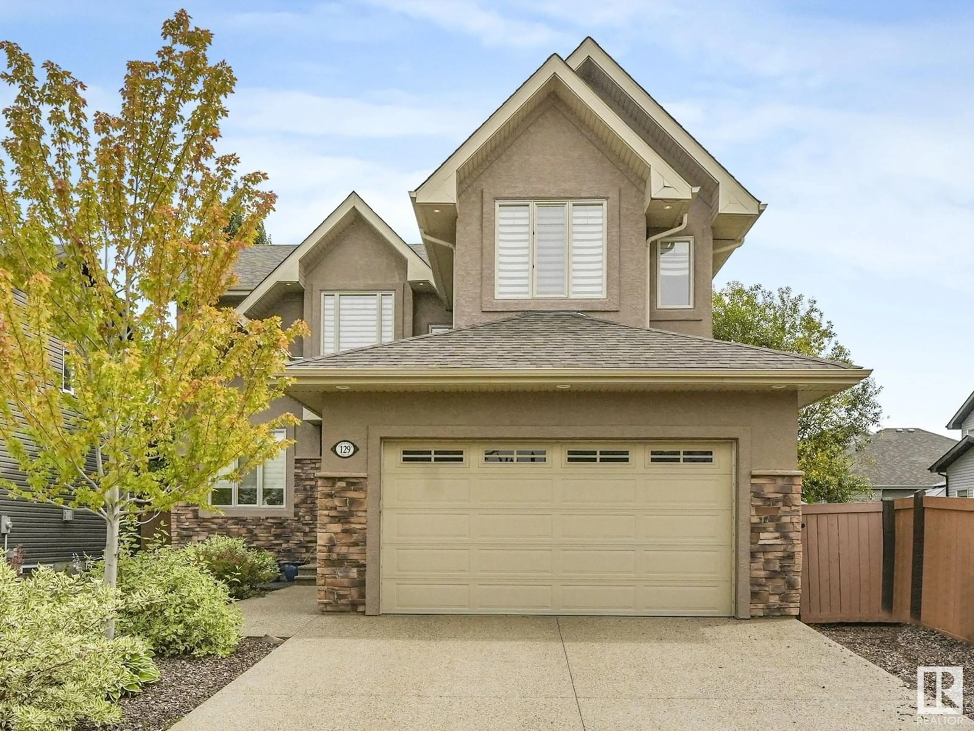 Home with vinyl exterior material, street for 129 NORTH RIDGE DR, St. Albert Alberta T8N3V1