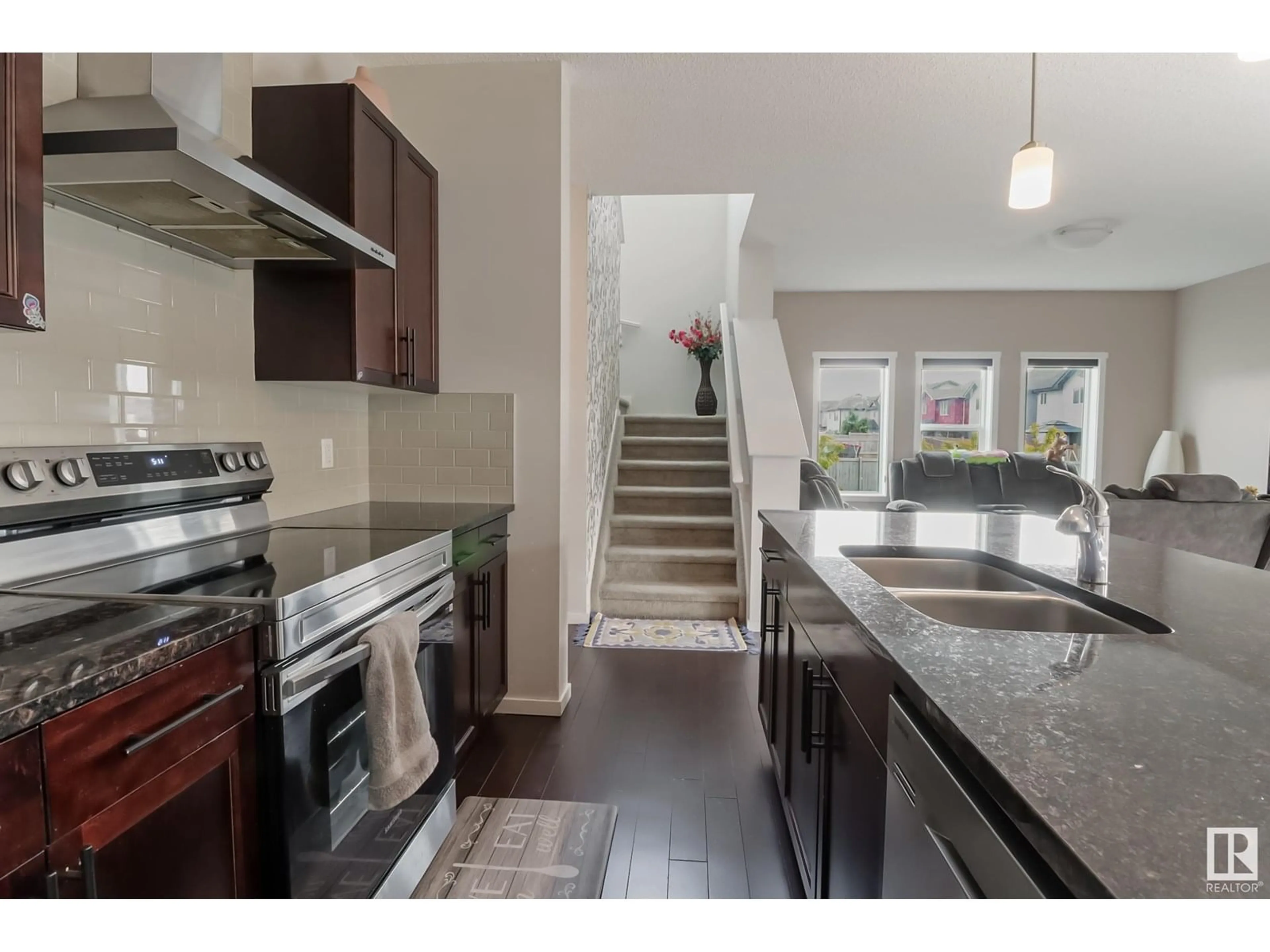 Open concept kitchen, unknown for NW - 1404 29 ST, Edmonton Alberta T6T1A8