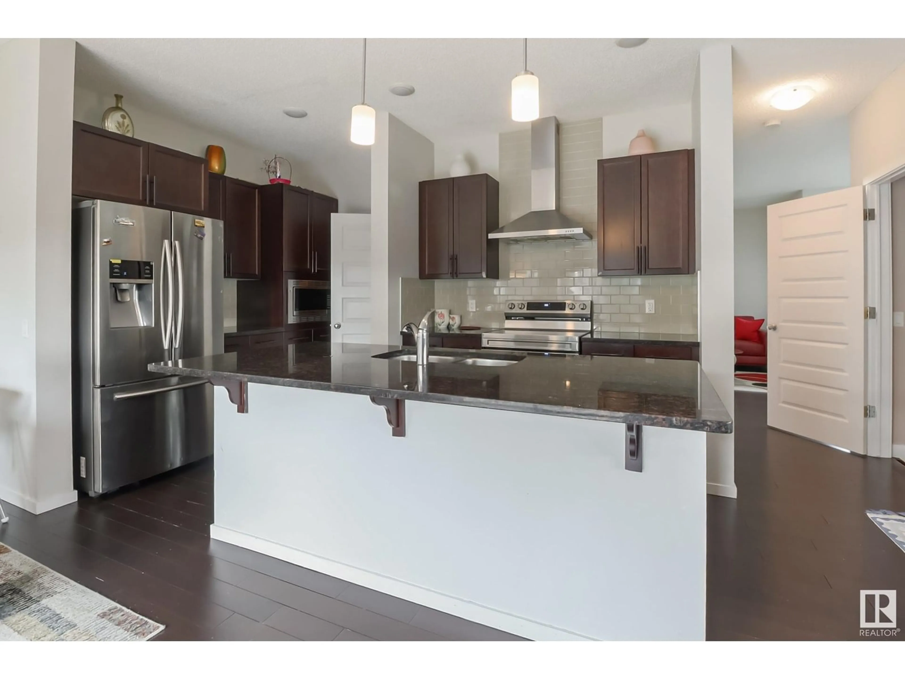 Open concept kitchen, unknown for NW - 1404 29 ST, Edmonton Alberta T6T1A8