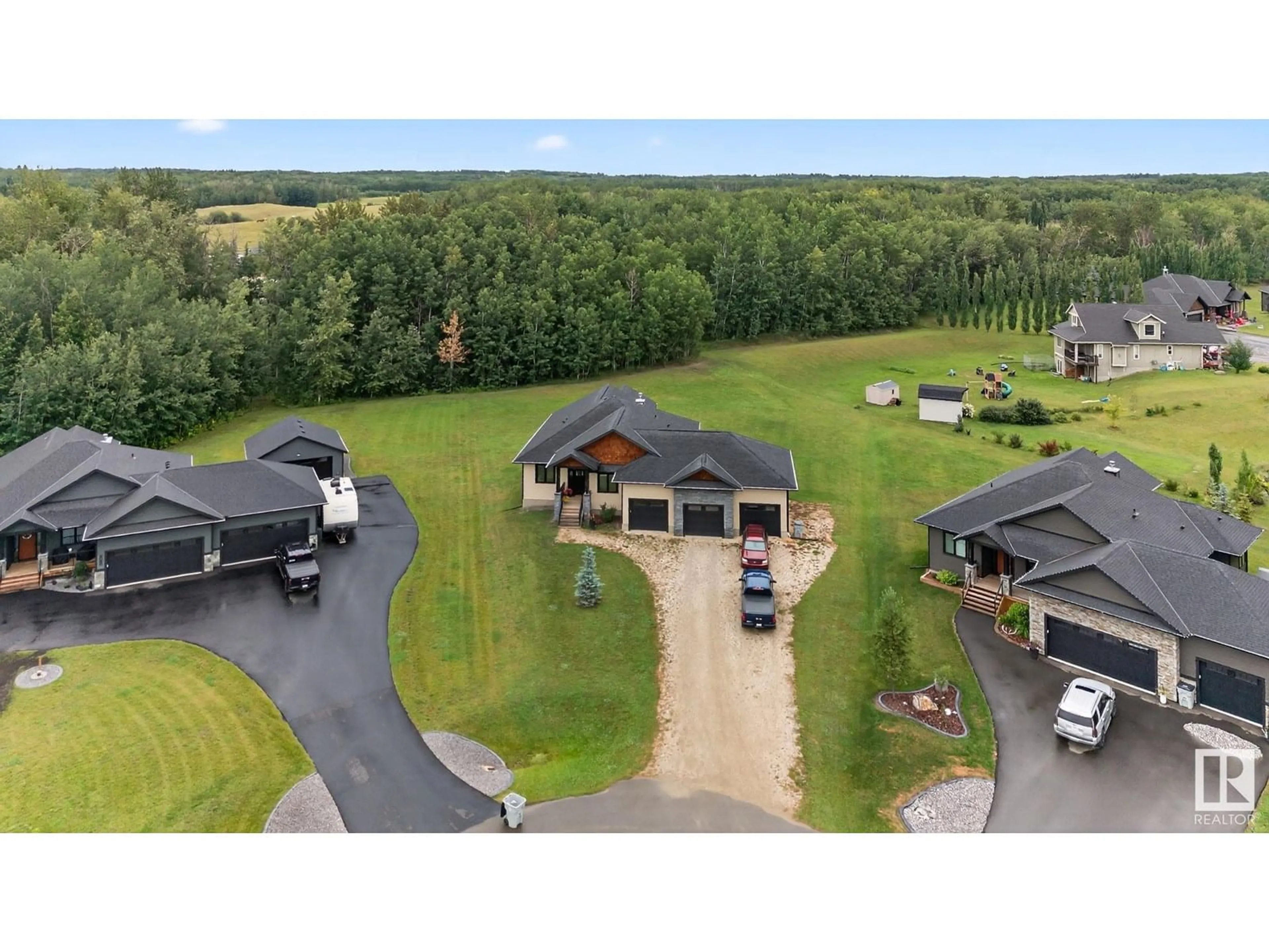 A pic from outside/outdoor area/front of a property/back of a property/a pic from drone, unknown for 2027 JUNIPER LN, Rural Parkland County Alberta T7Z0G8