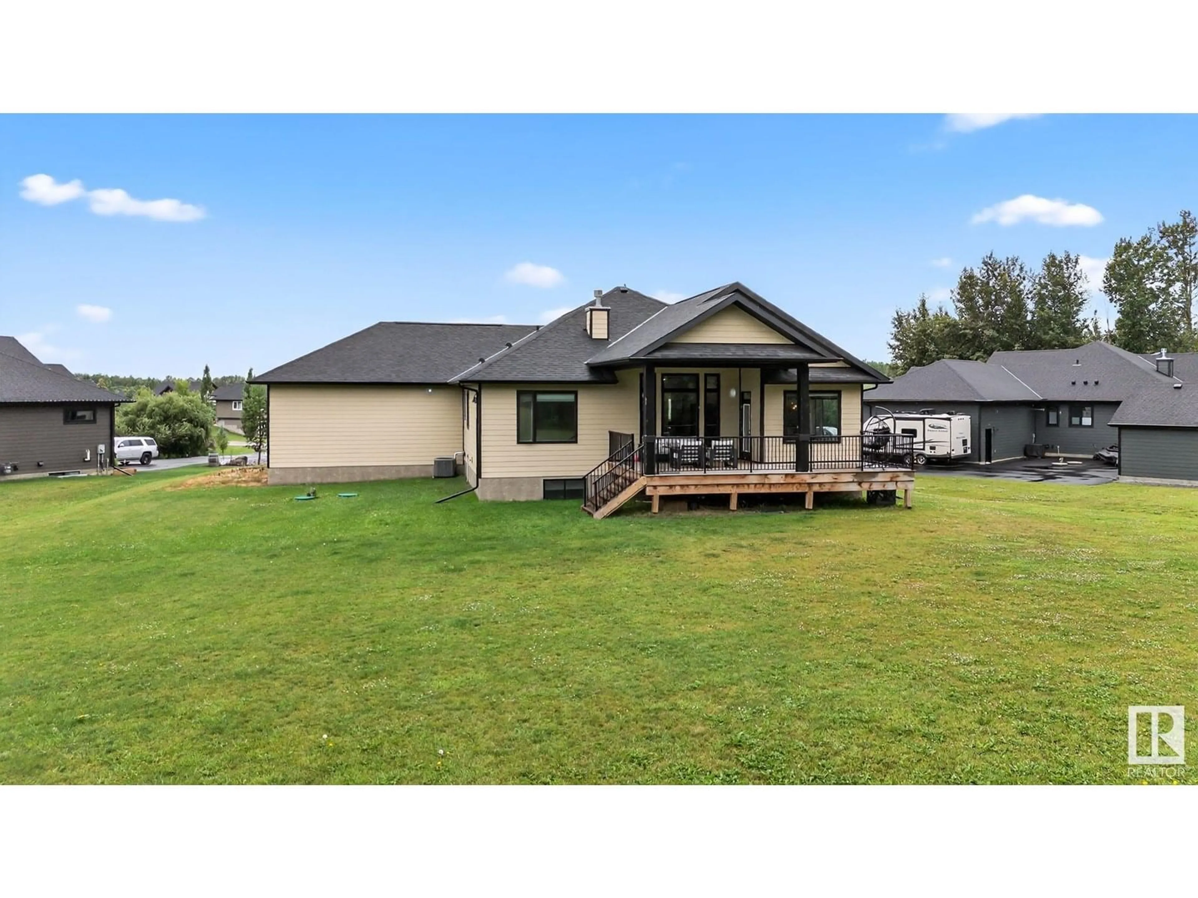 A pic from outside/outdoor area/front of a property/back of a property/a pic from drone, water/lake/river/ocean view for 2027 JUNIPER LN, Rural Parkland County Alberta T7Z0G8