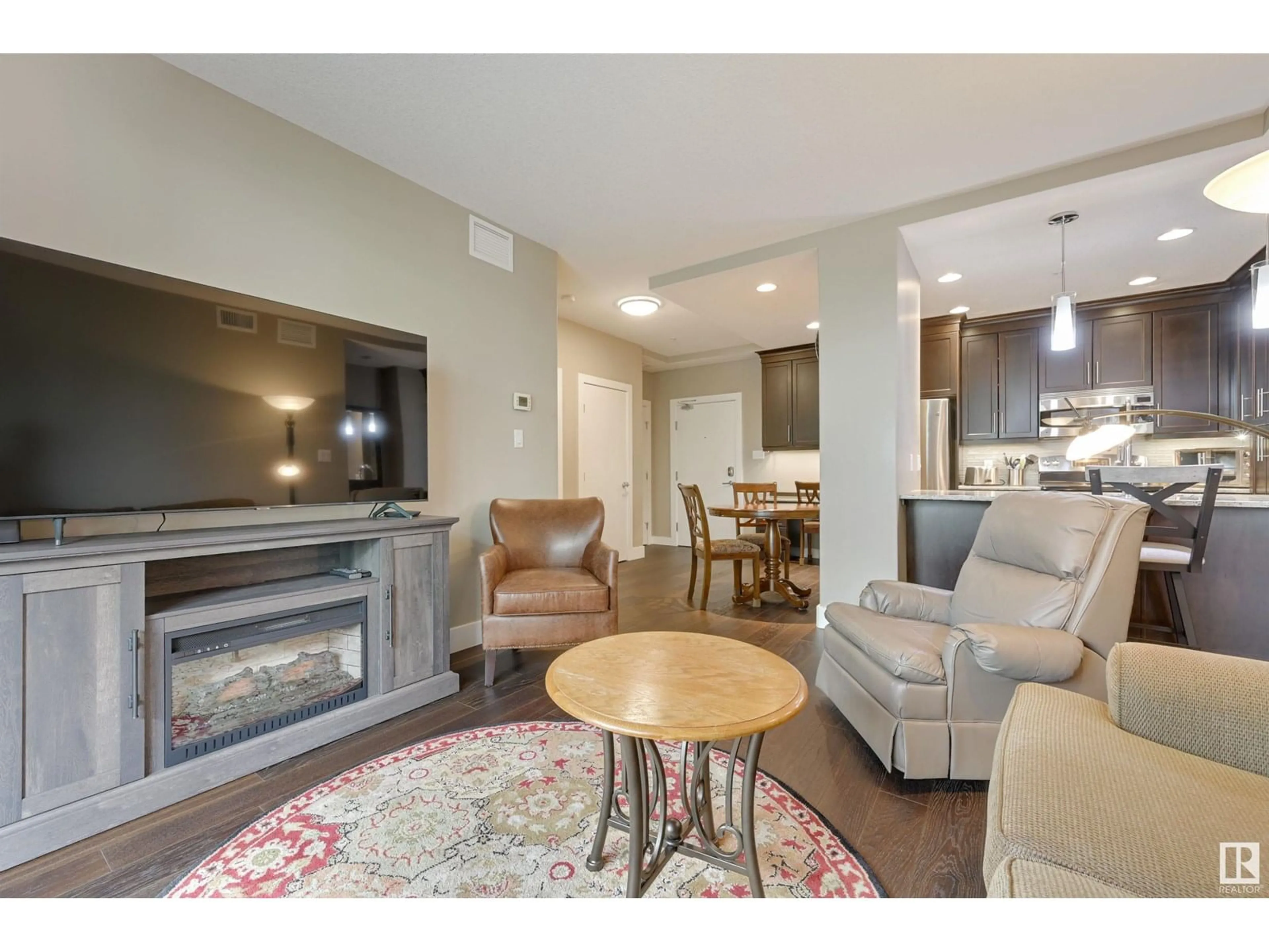 Living room with furniture, wood/laminate floor for #221 - 11080 ELLERSLIE RD, Edmonton Alberta T6W2C2