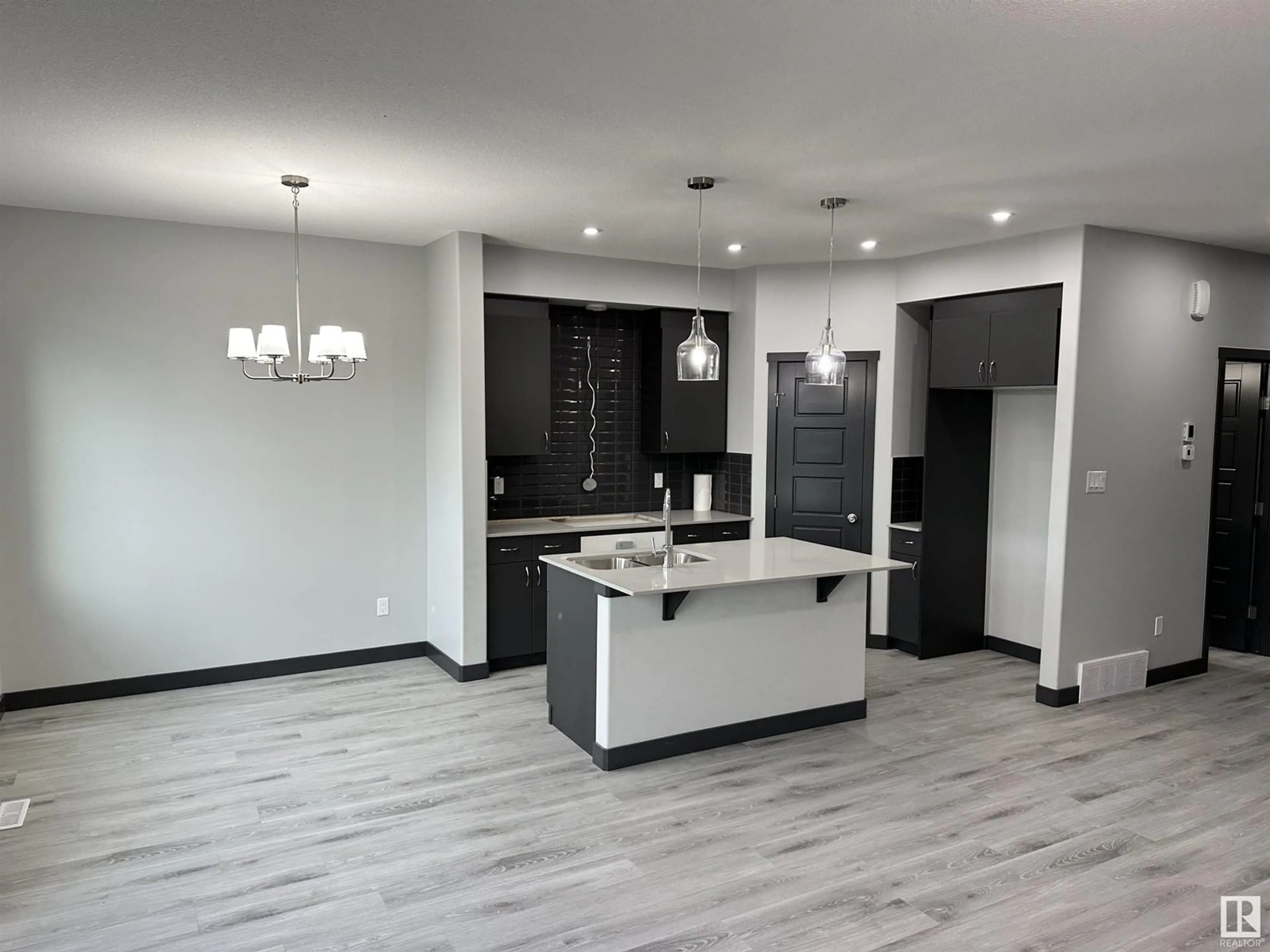 Open concept kitchen, ceramic/tile floor for 7232 182 AV, Edmonton Alberta T5Y4B7
