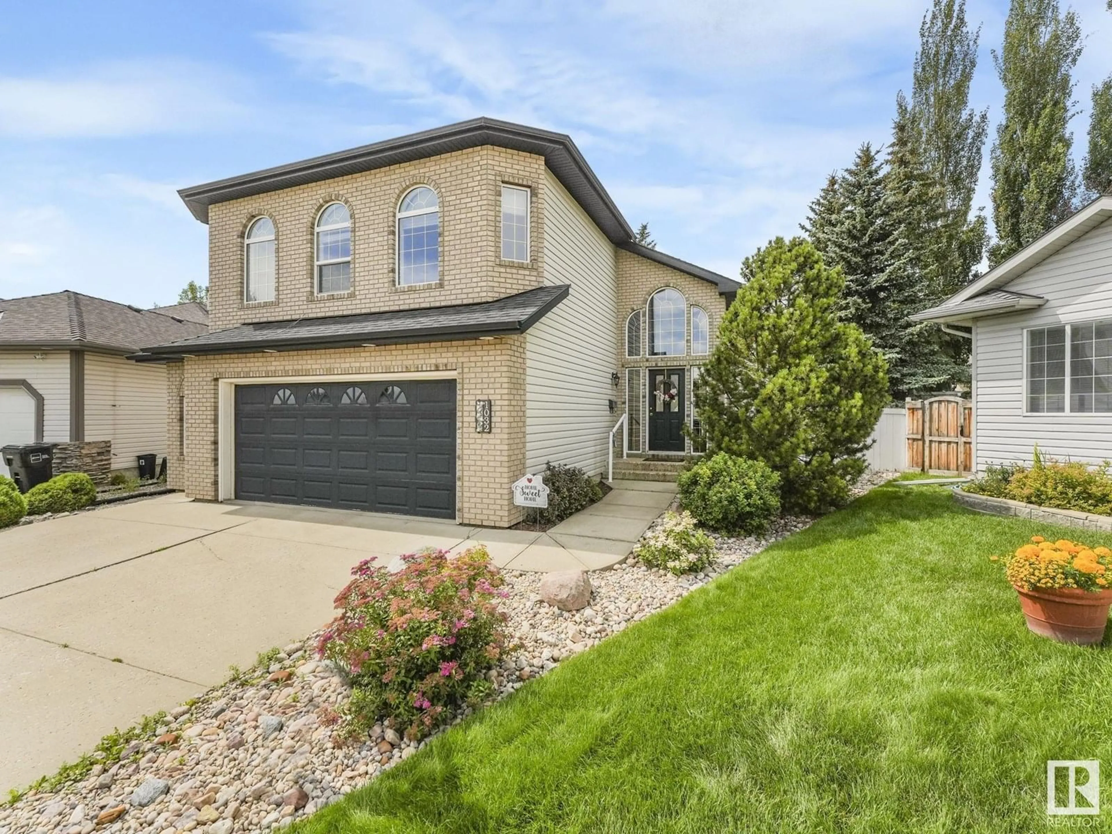 Home with brick exterior material, street for 1032 ORMSBY CR, Edmonton Alberta T5T6H5