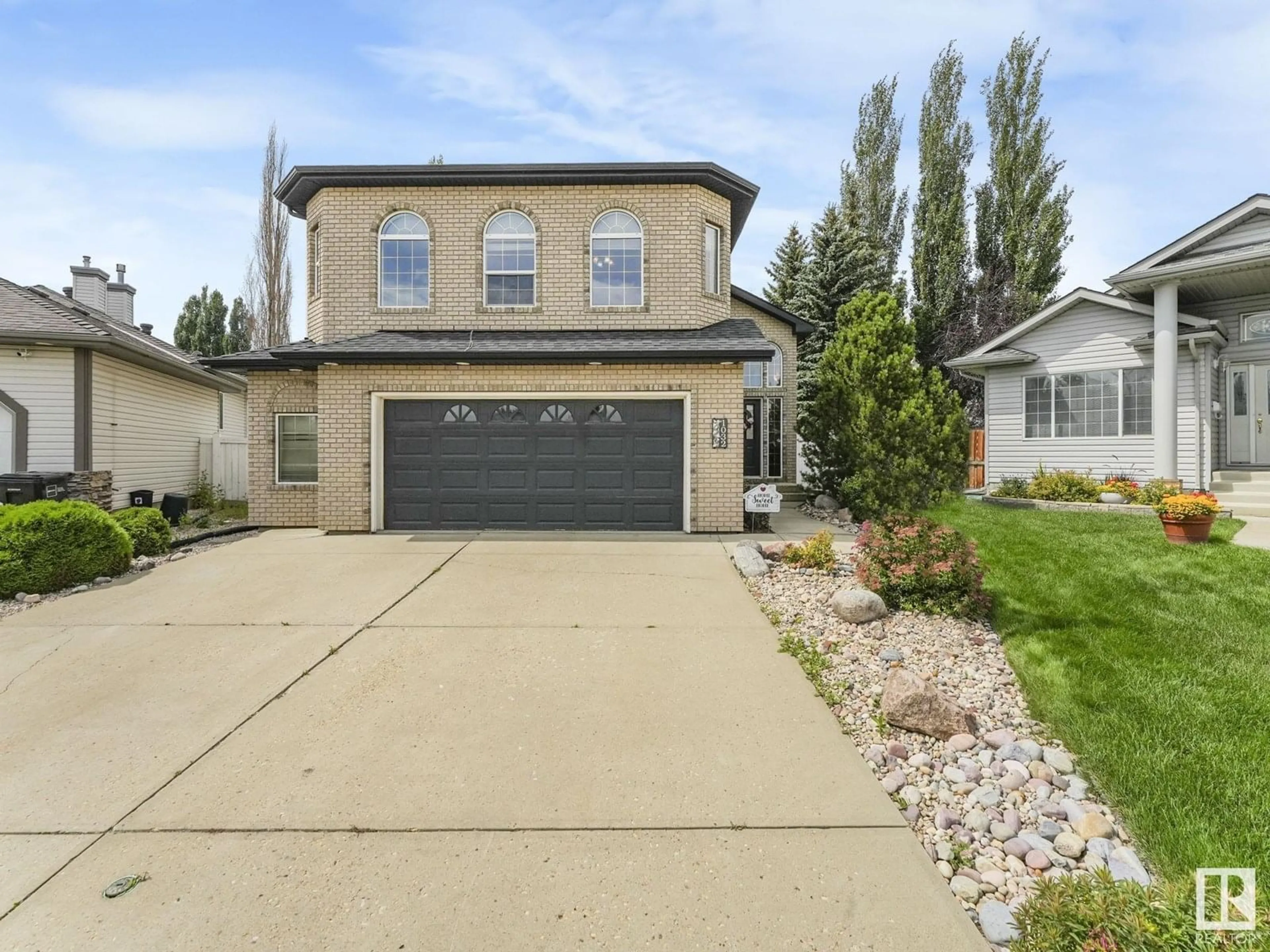Home with vinyl exterior material, street for 1032 ORMSBY CR, Edmonton Alberta T5T6H5
