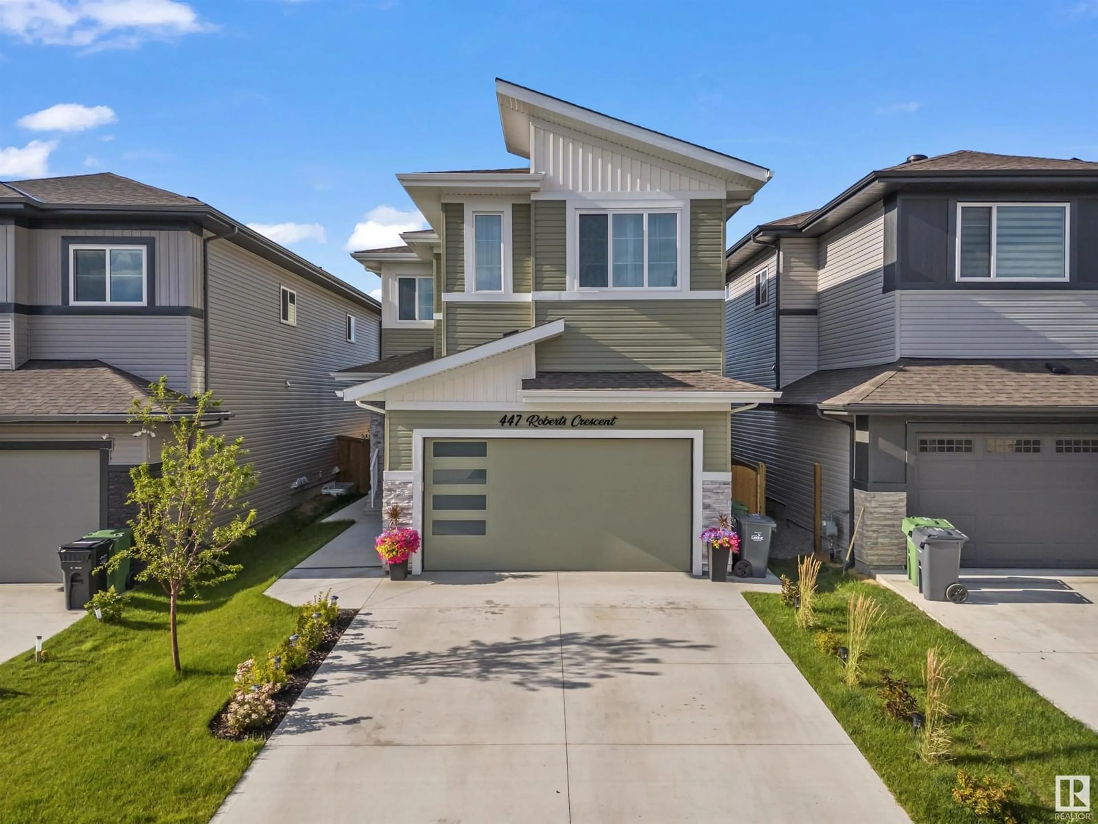 Home with vinyl exterior material, street for 447 ROBERTS CR, Leduc Alberta T9E1N4