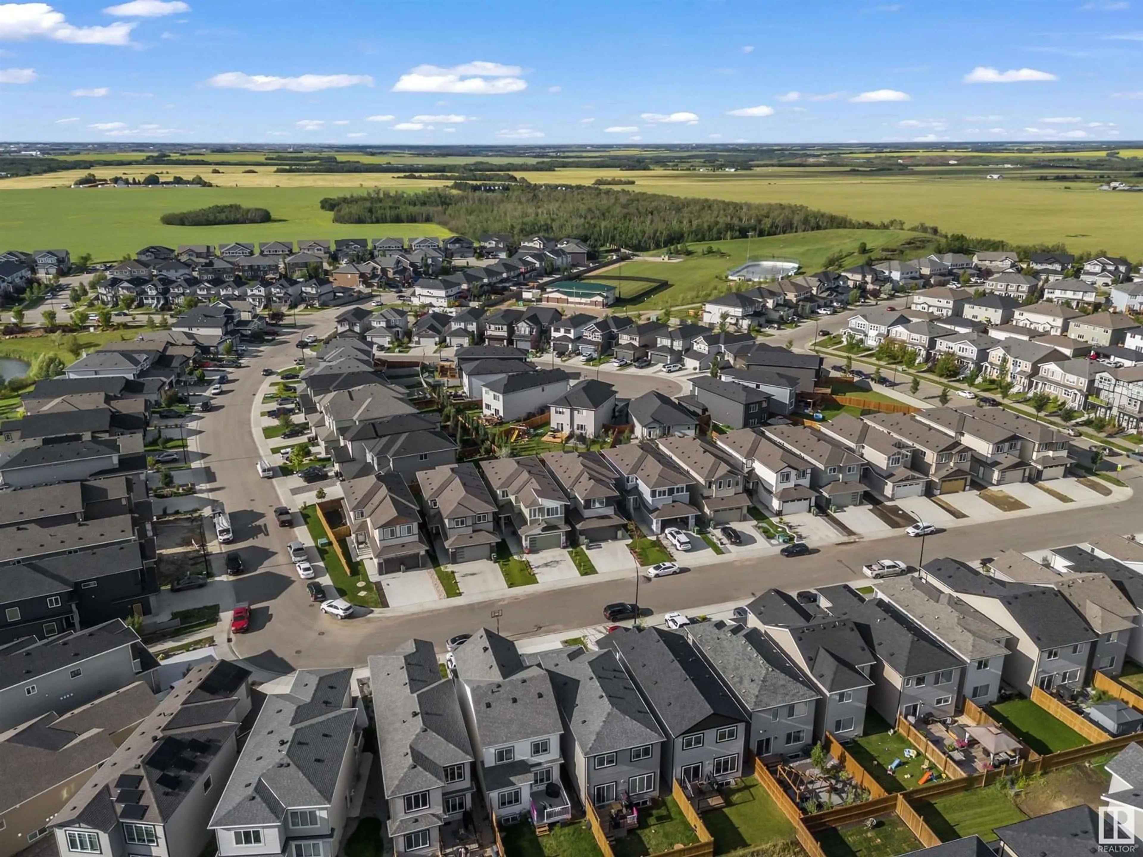 A pic from outside/outdoor area/front of a property/back of a property/a pic from drone, unknown for 447 ROBERTS CR, Leduc Alberta T9E1N4