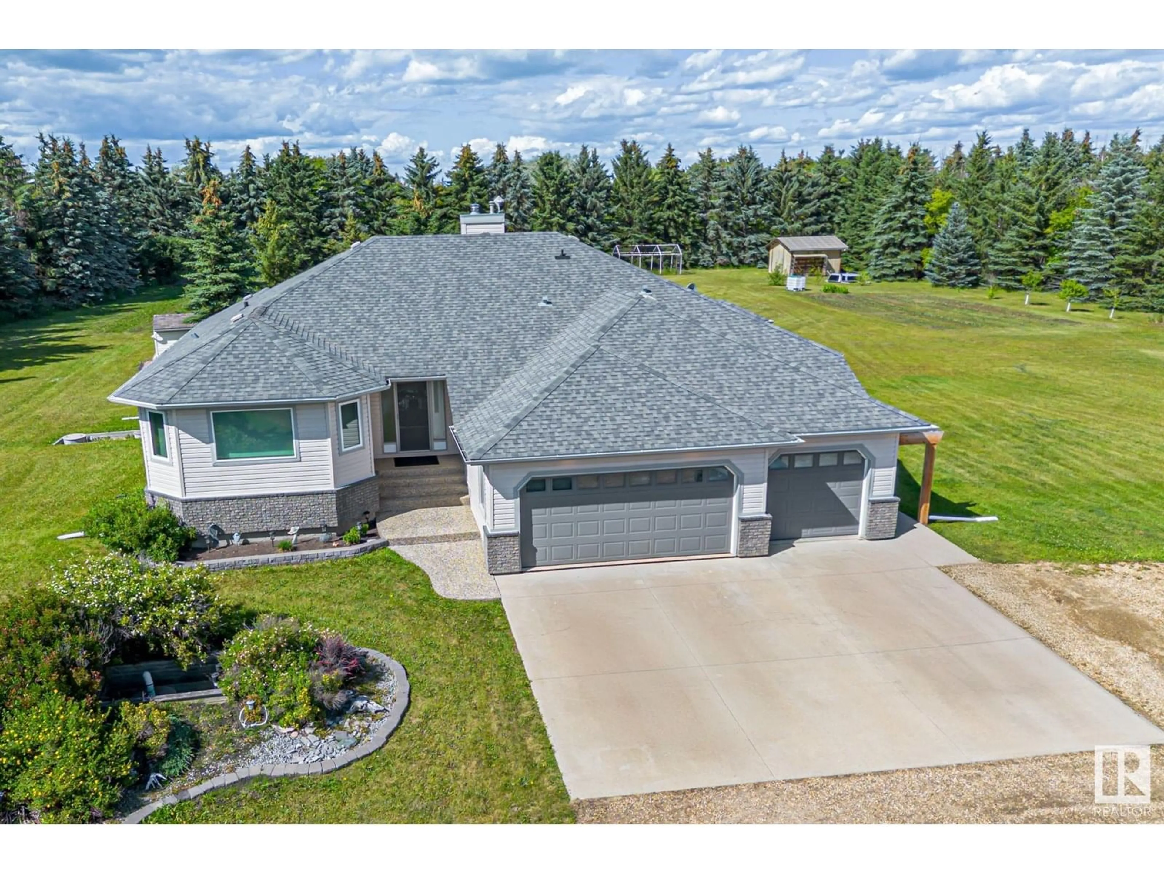 A pic from outside/outdoor area/front of a property/back of a property/a pic from drone, street for #9 - 25415 HWY 37, Rural Sturgeon County Alberta T8T0C6