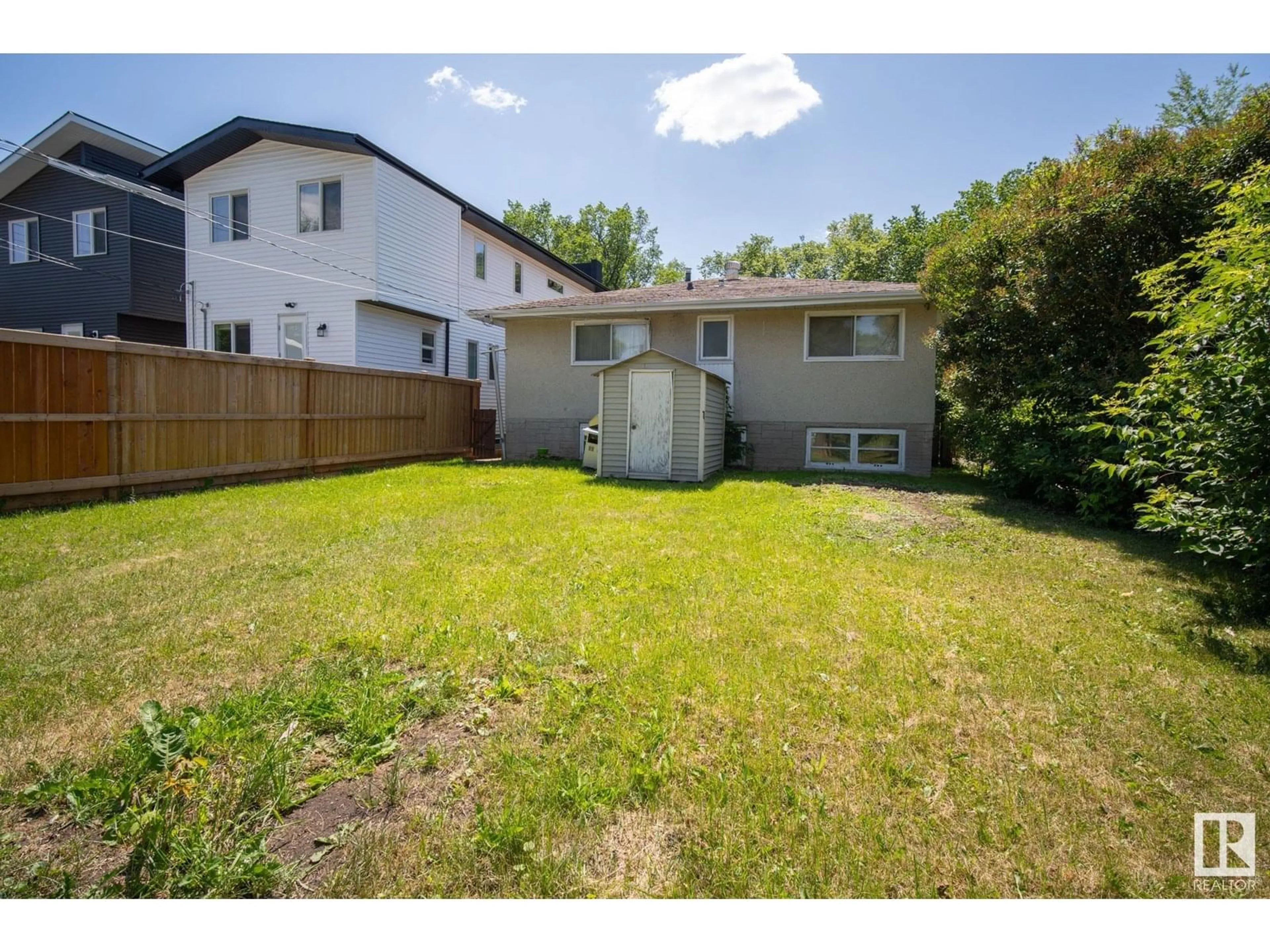 A pic from outside/outdoor area/front of a property/back of a property/a pic from drone, street for 7528 80 AV, Edmonton Alberta T6C0S4
