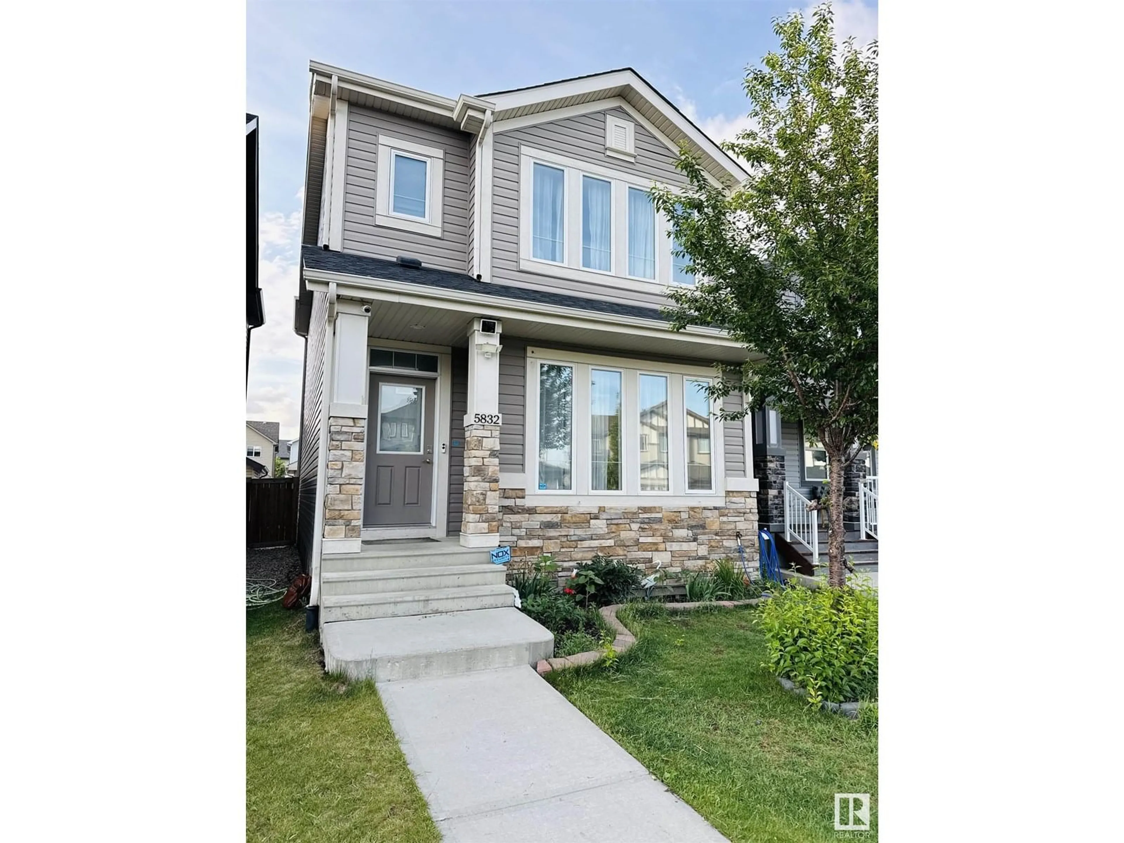 Home with vinyl exterior material, street for 5832 ANTHONY CR, Edmonton Alberta T6W3H5