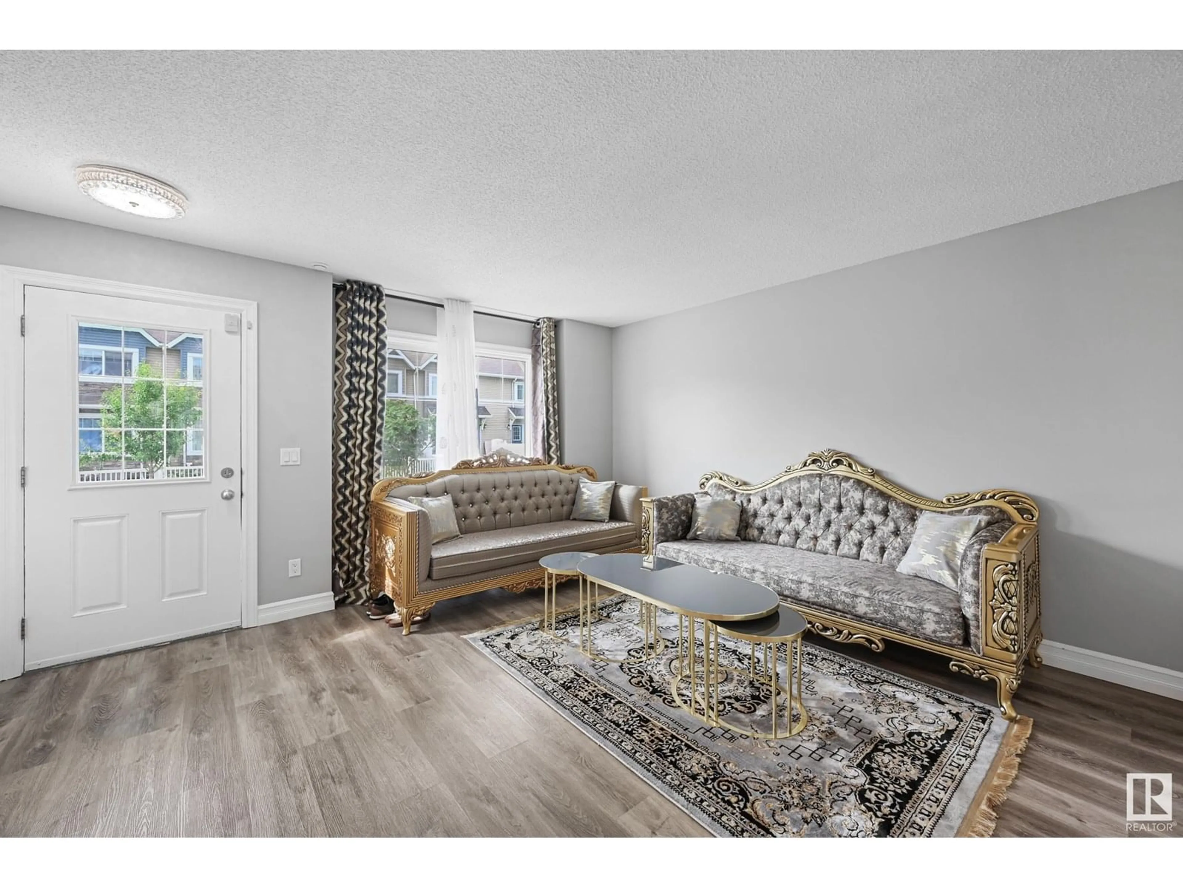 Living room with furniture, unknown for 52 14621 121 ST NW, Edmonton Alberta T5X0H2