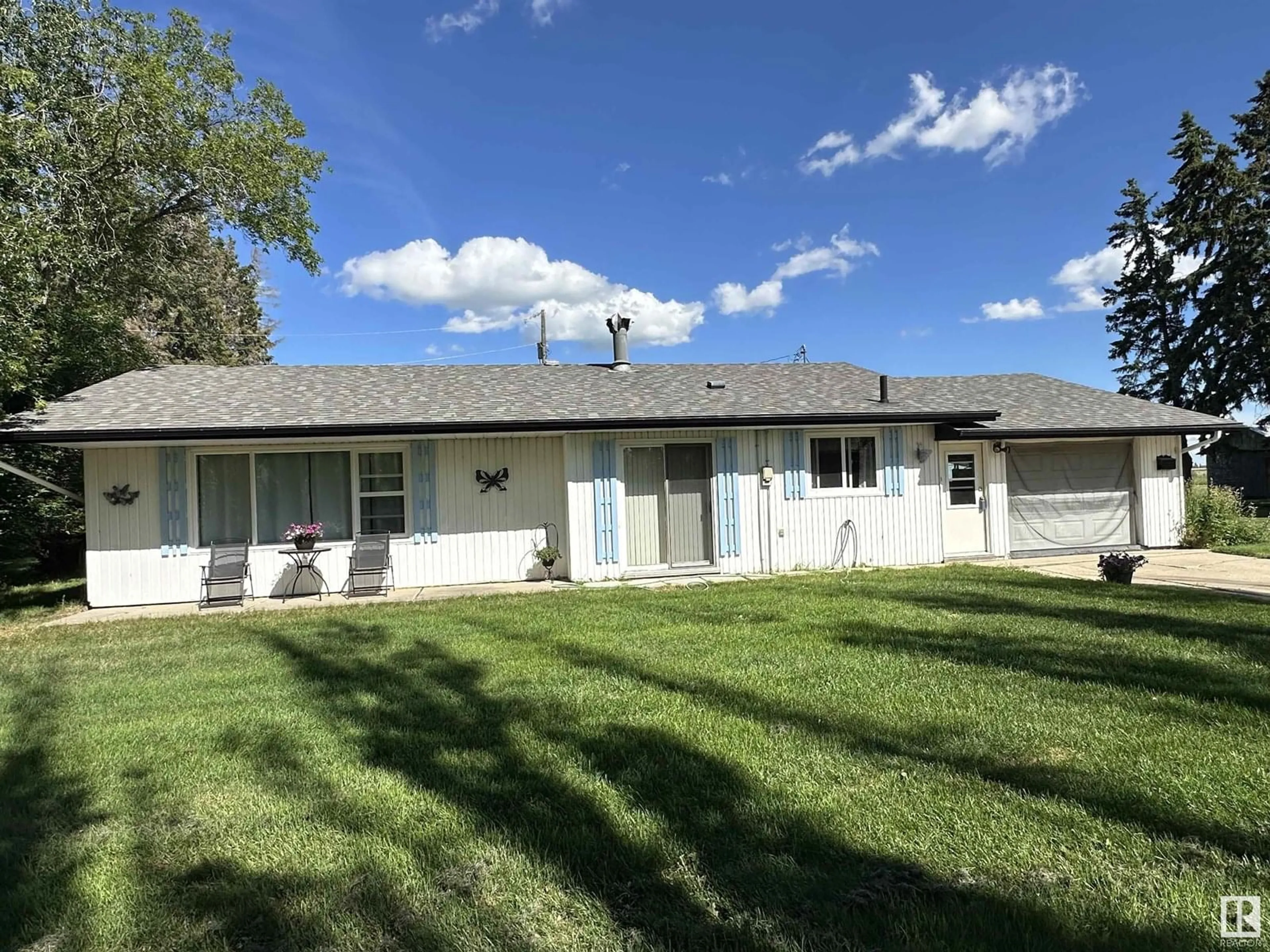 Home with vinyl exterior material, street for 241075 TWP ROAD 461, Rural Wetaskiwin County Alberta T9A1X1