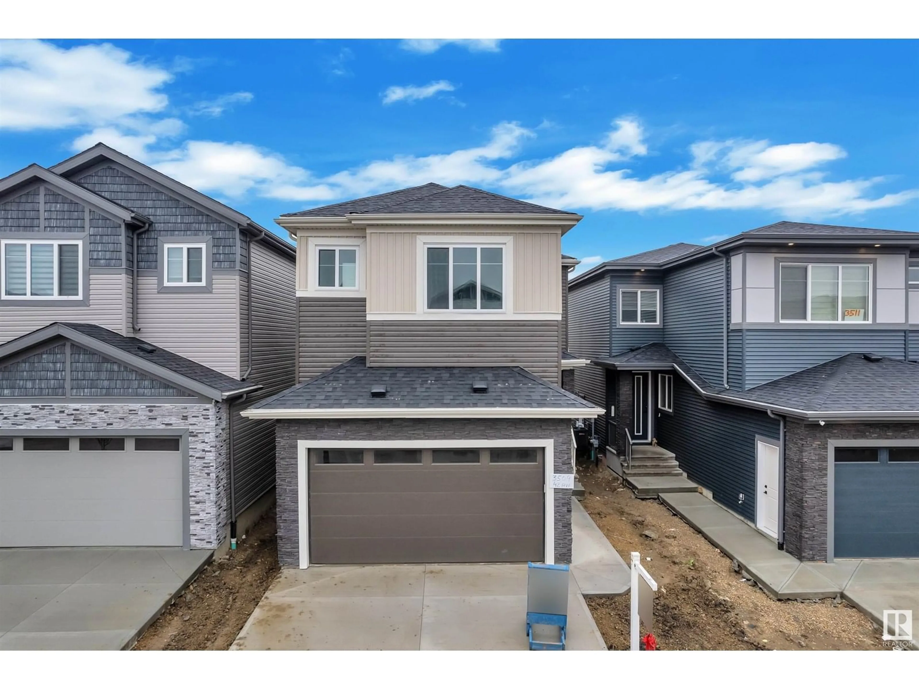 A pic from outside/outdoor area/front of a property/back of a property/a pic from drone, street for 3515 42 AV, Beaumont Alberta T4X0C4