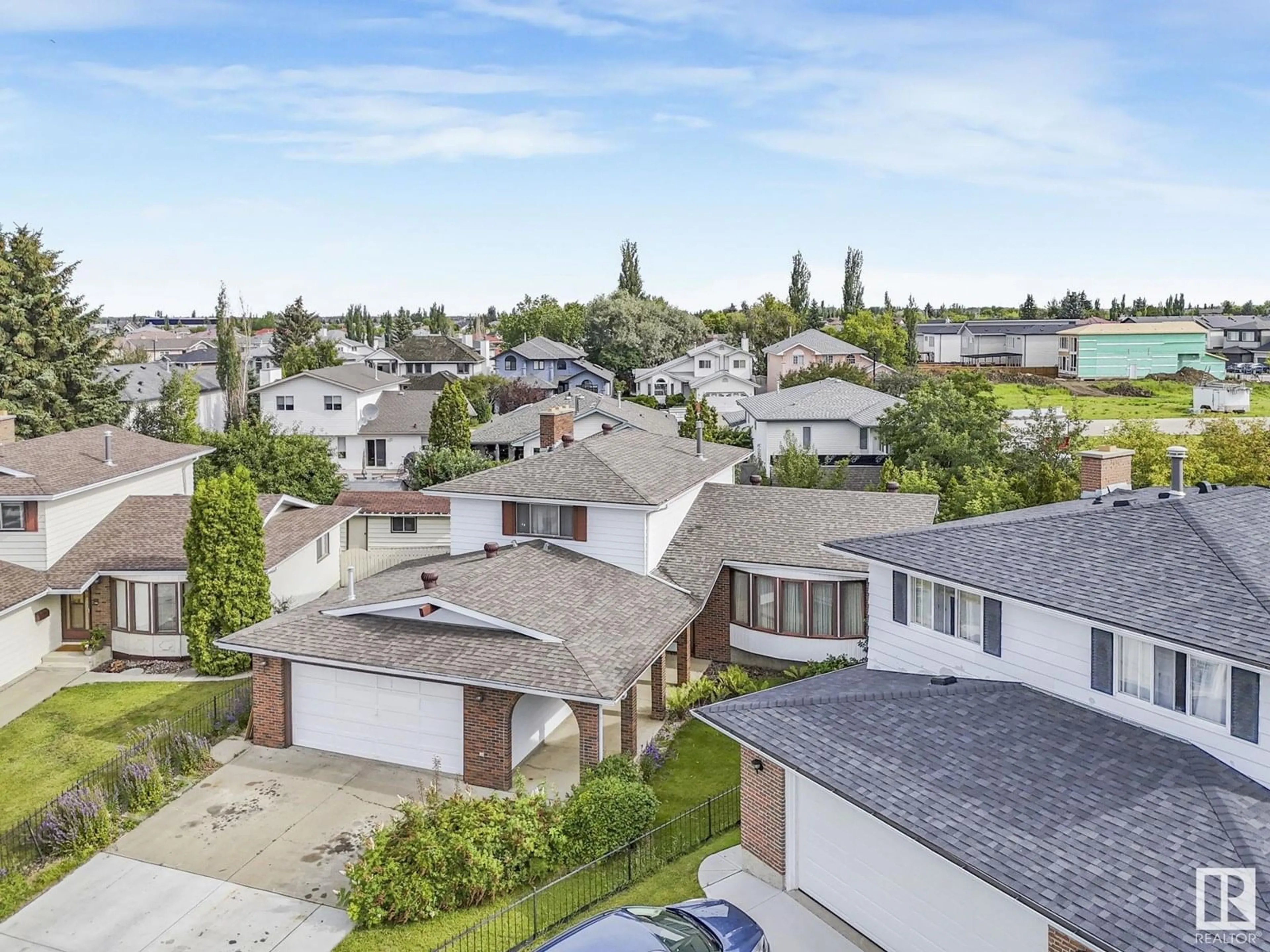 A pic from outside/outdoor area/front of a property/back of a property/a pic from drone, street for 10206 173A AV, Edmonton Alberta T5X3X2