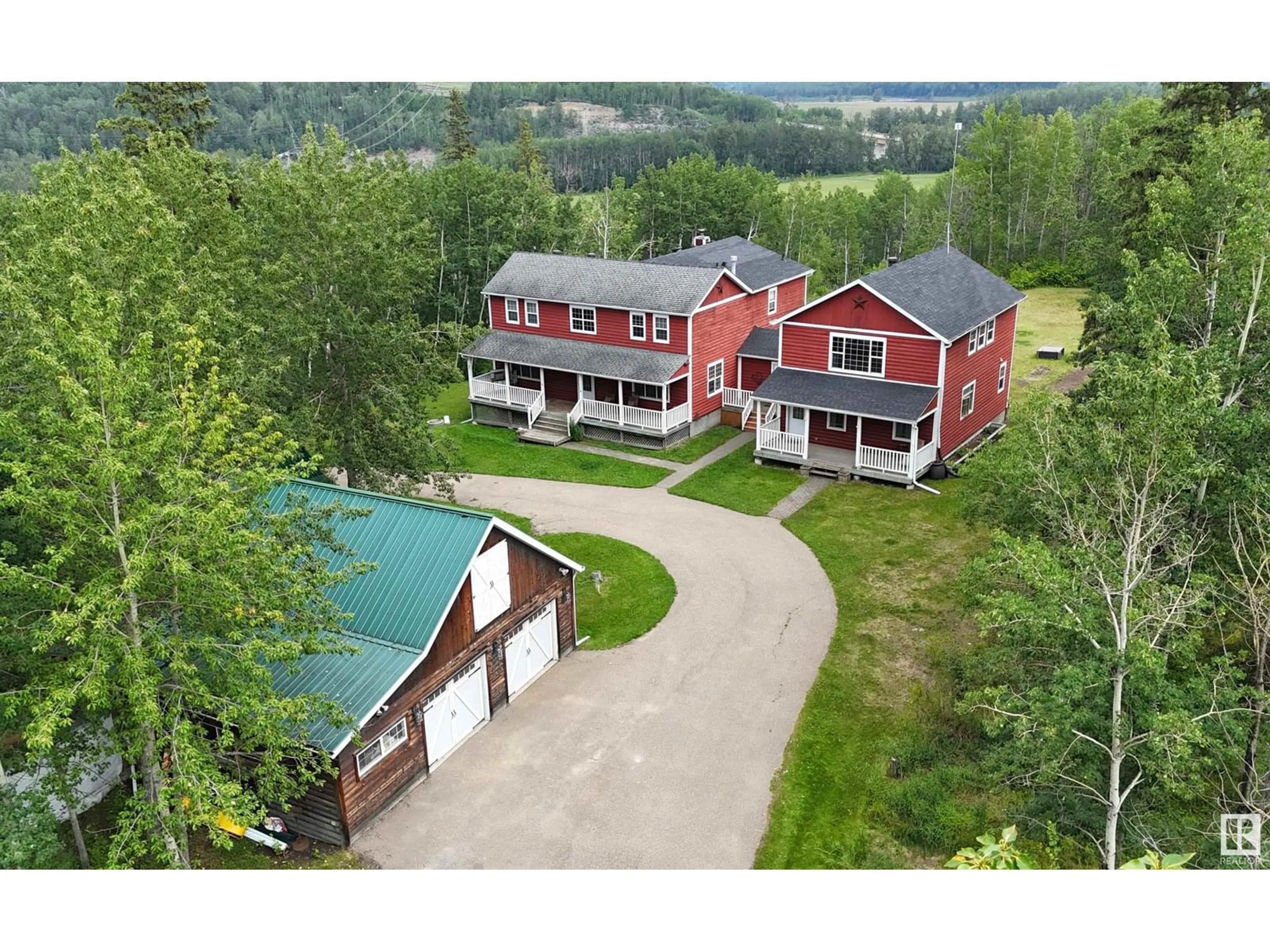 A pic from outside/outdoor area/front of a property/back of a property/a pic from drone, unknown for 2544 HWY 770, Rural Leduc County Alberta T0C2T0