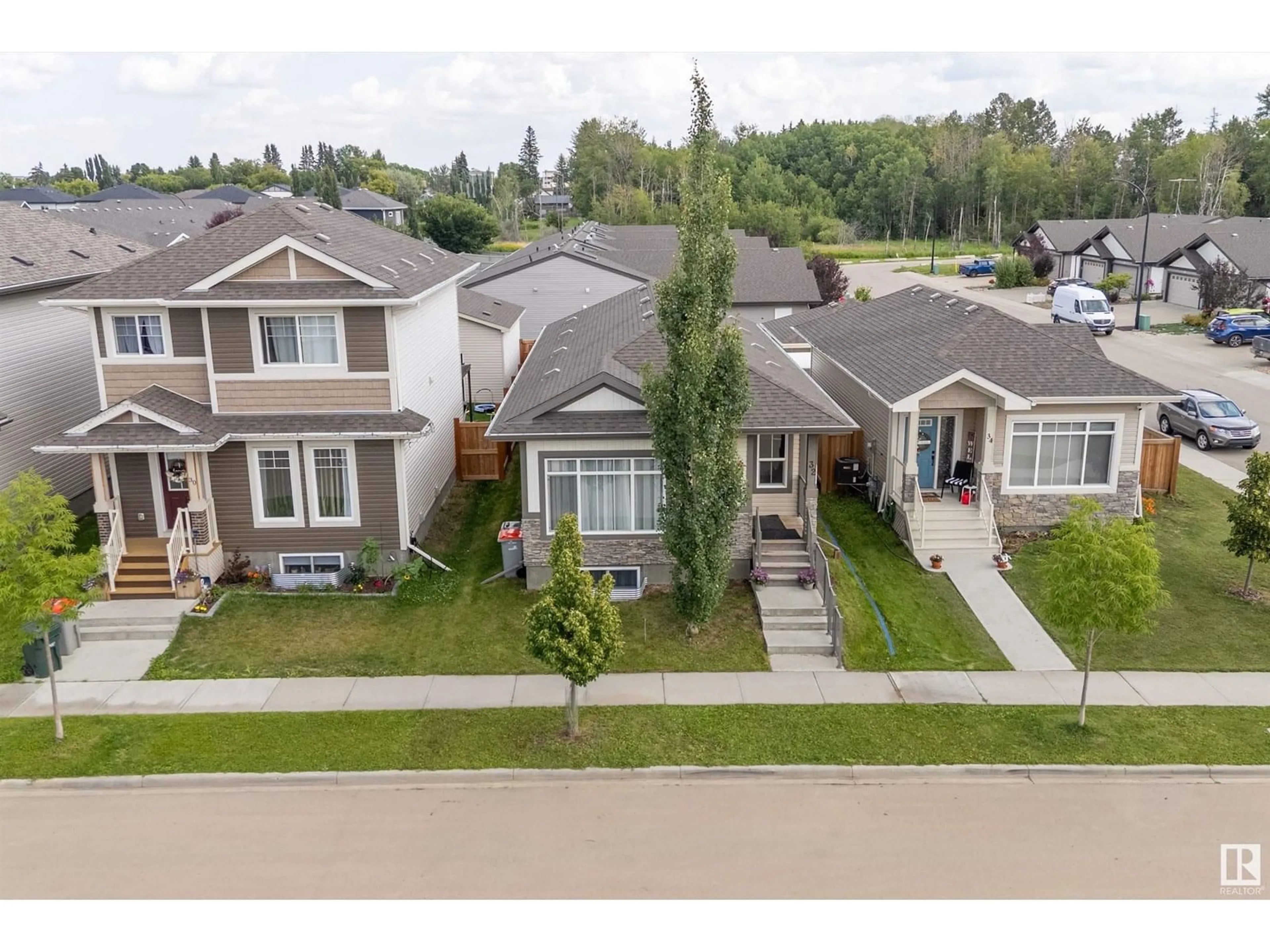 A pic from outside/outdoor area/front of a property/back of a property/a pic from drone, street for 32 BRICKYARD DR, Stony Plain Alberta T7Z0L2