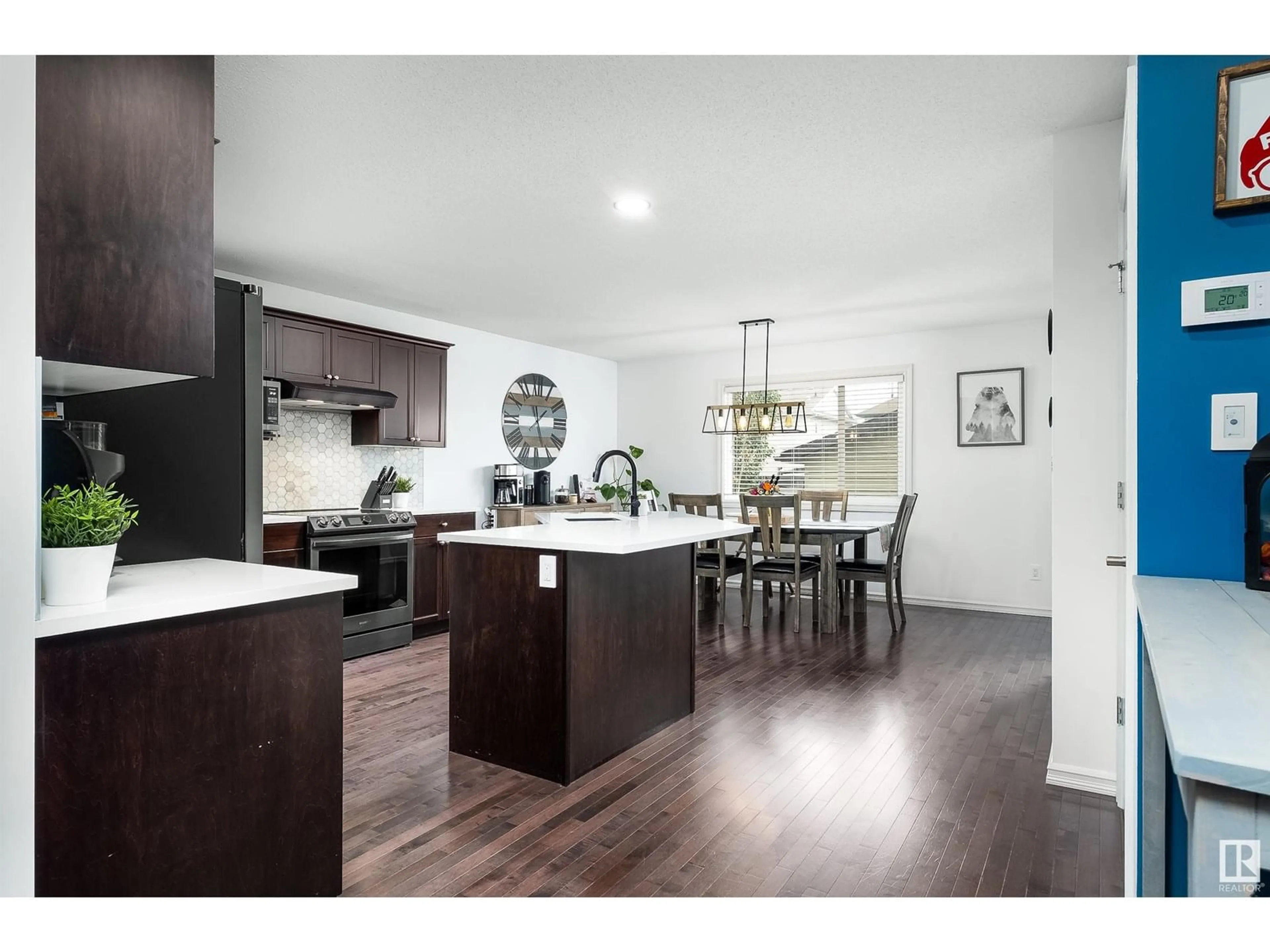 Open concept kitchen, wood/laminate floor for 80 KYESTONE CR, Leduc Alberta T9E0M6