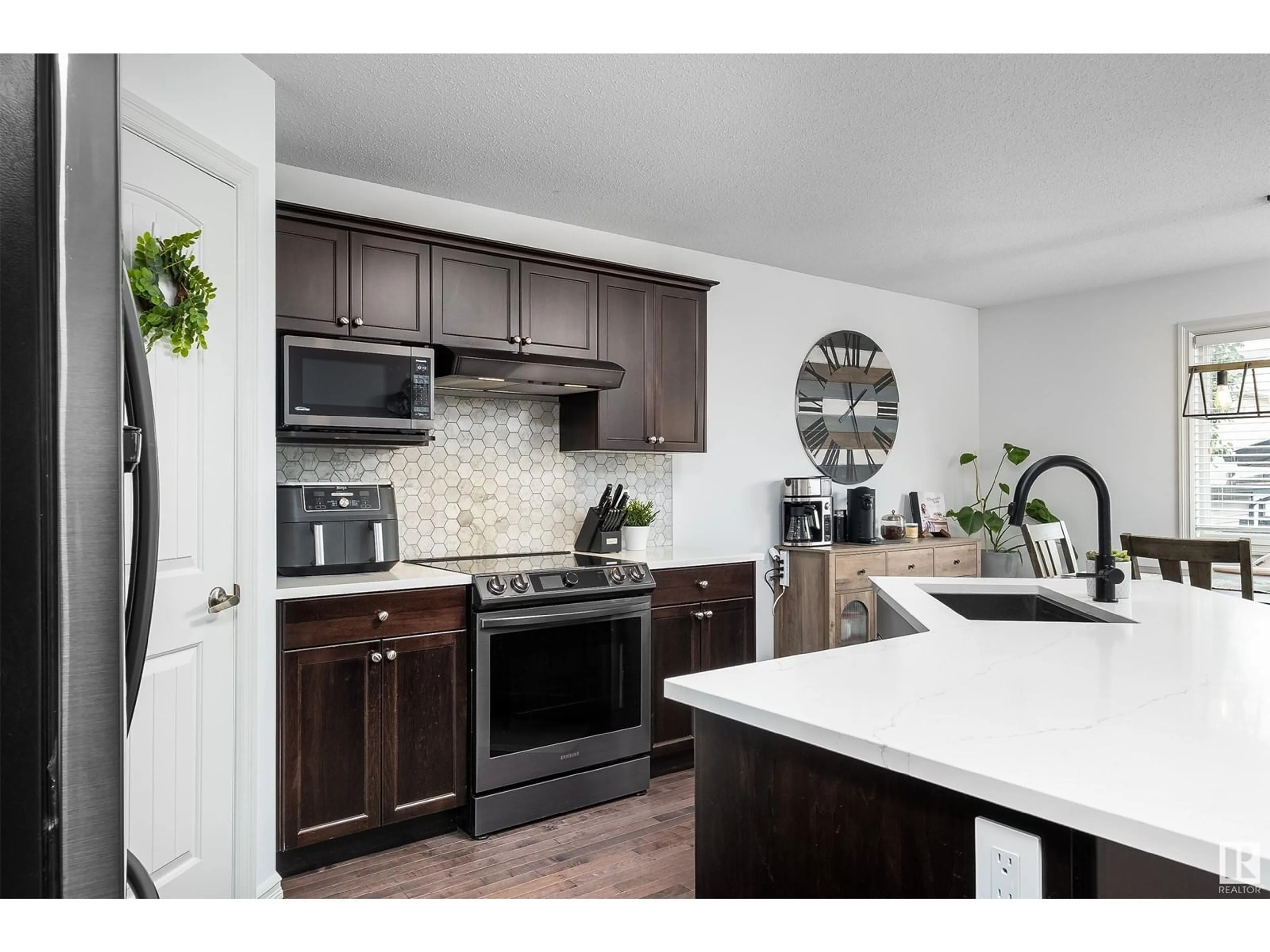 Open concept kitchen, ceramic/tile floor for 80 KYESTONE CR, Leduc Alberta T9E0M6