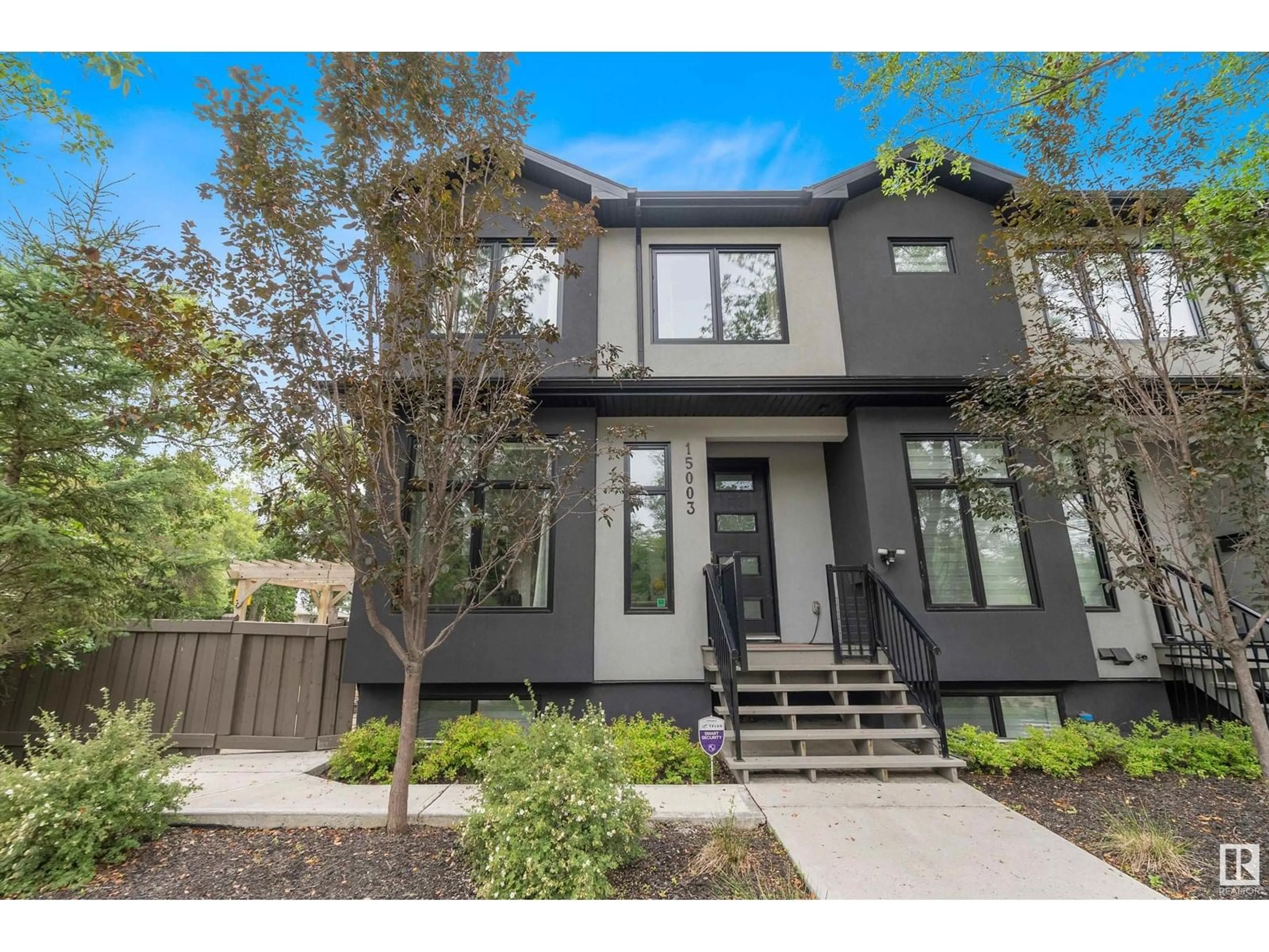 Home with brick exterior material, street for NW - 15003 108 AV, Edmonton Alberta T5E5Y1