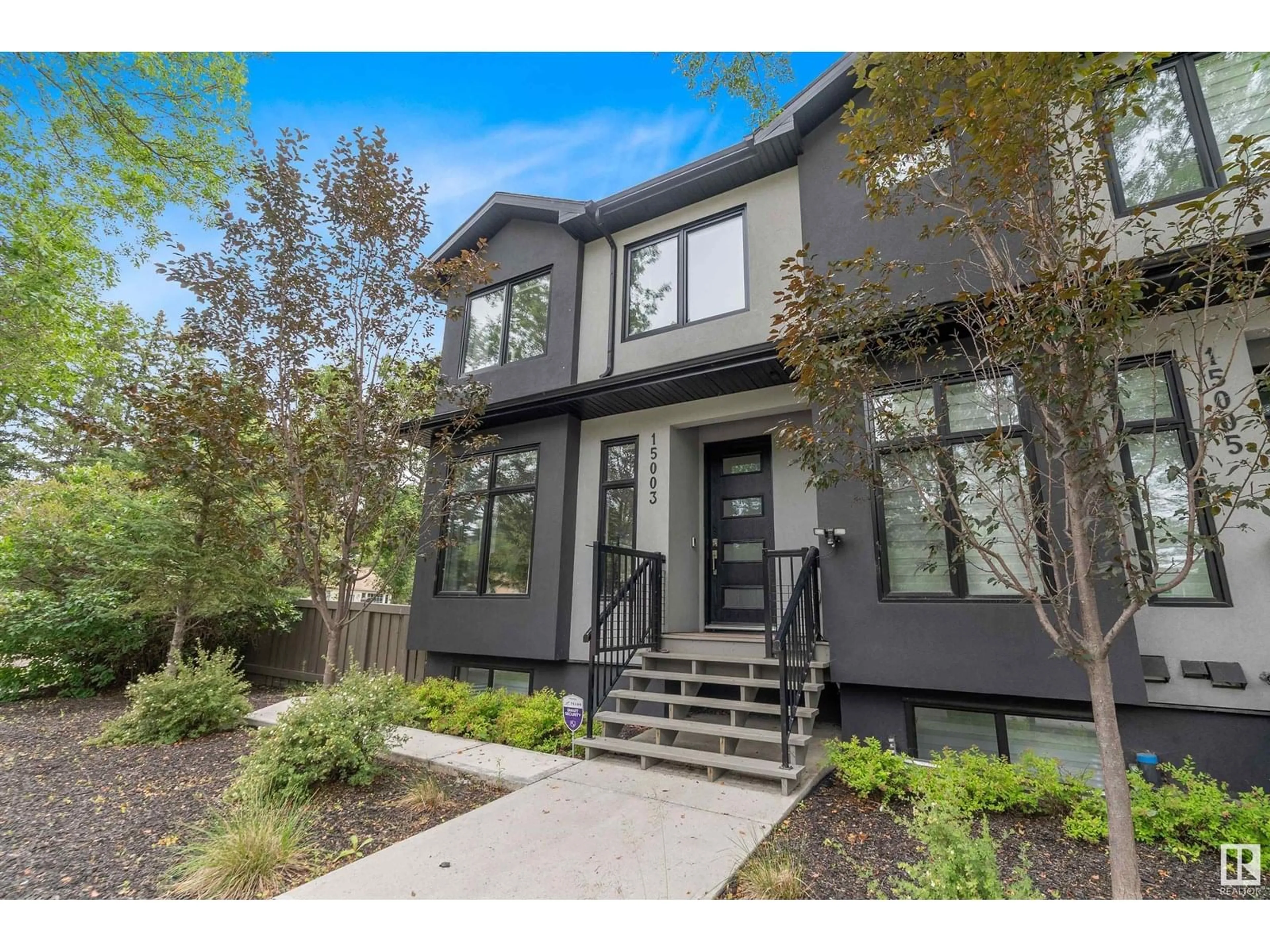 Home with brick exterior material, street for NW - 15003 108 AV, Edmonton Alberta T5E5Y1