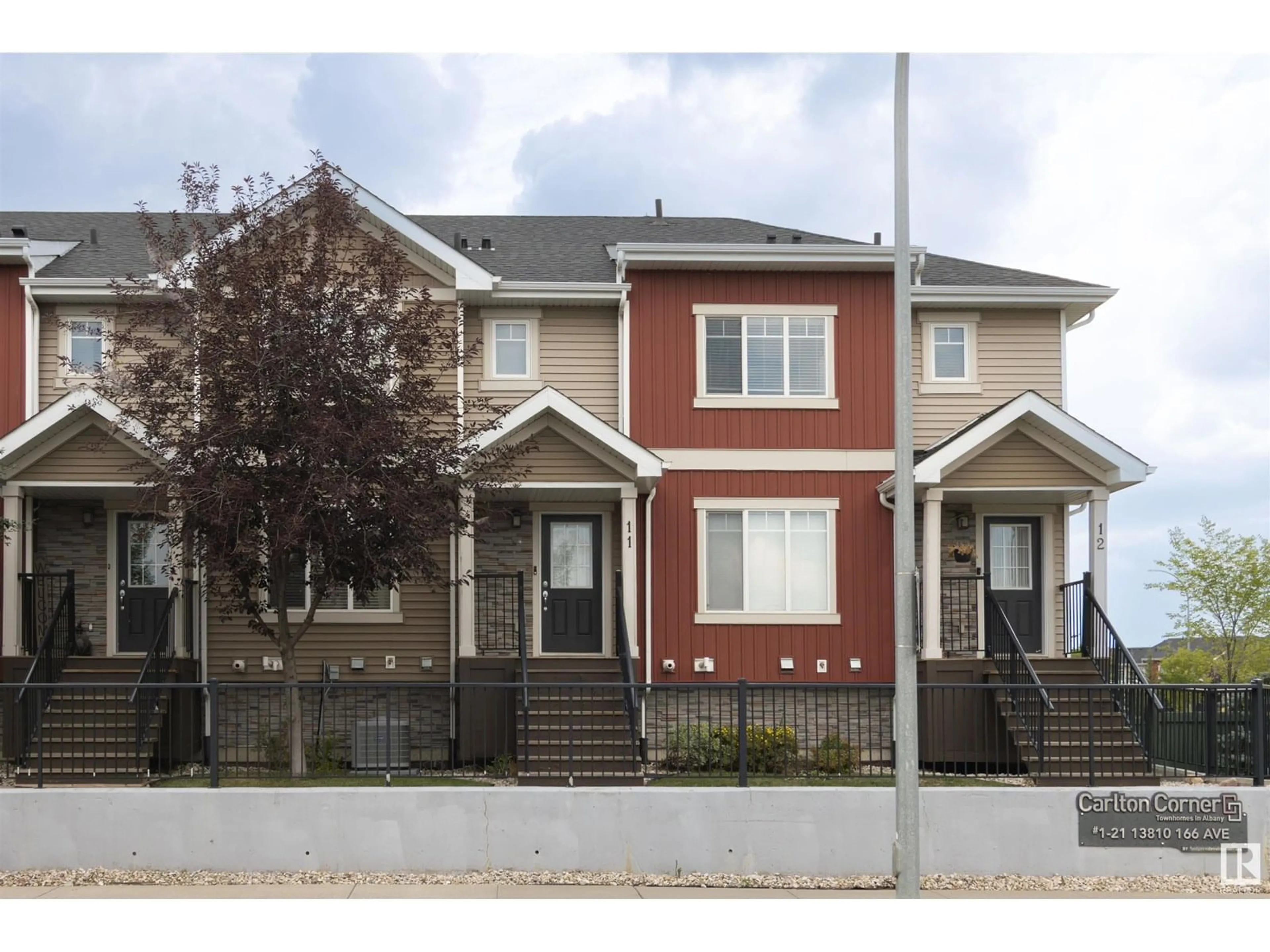 Home with vinyl exterior material, street for #11 - 13810 166 AV, Edmonton Alberta T6V0K4