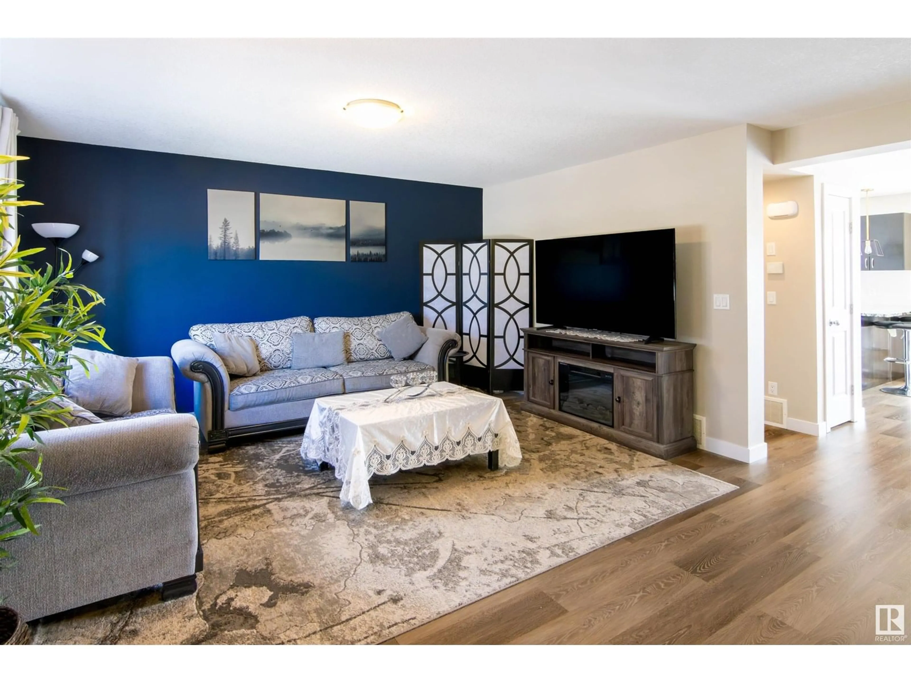 Living room with furniture, wood/laminate floor for #11 - 13810 166 AV, Edmonton Alberta T6V0K4