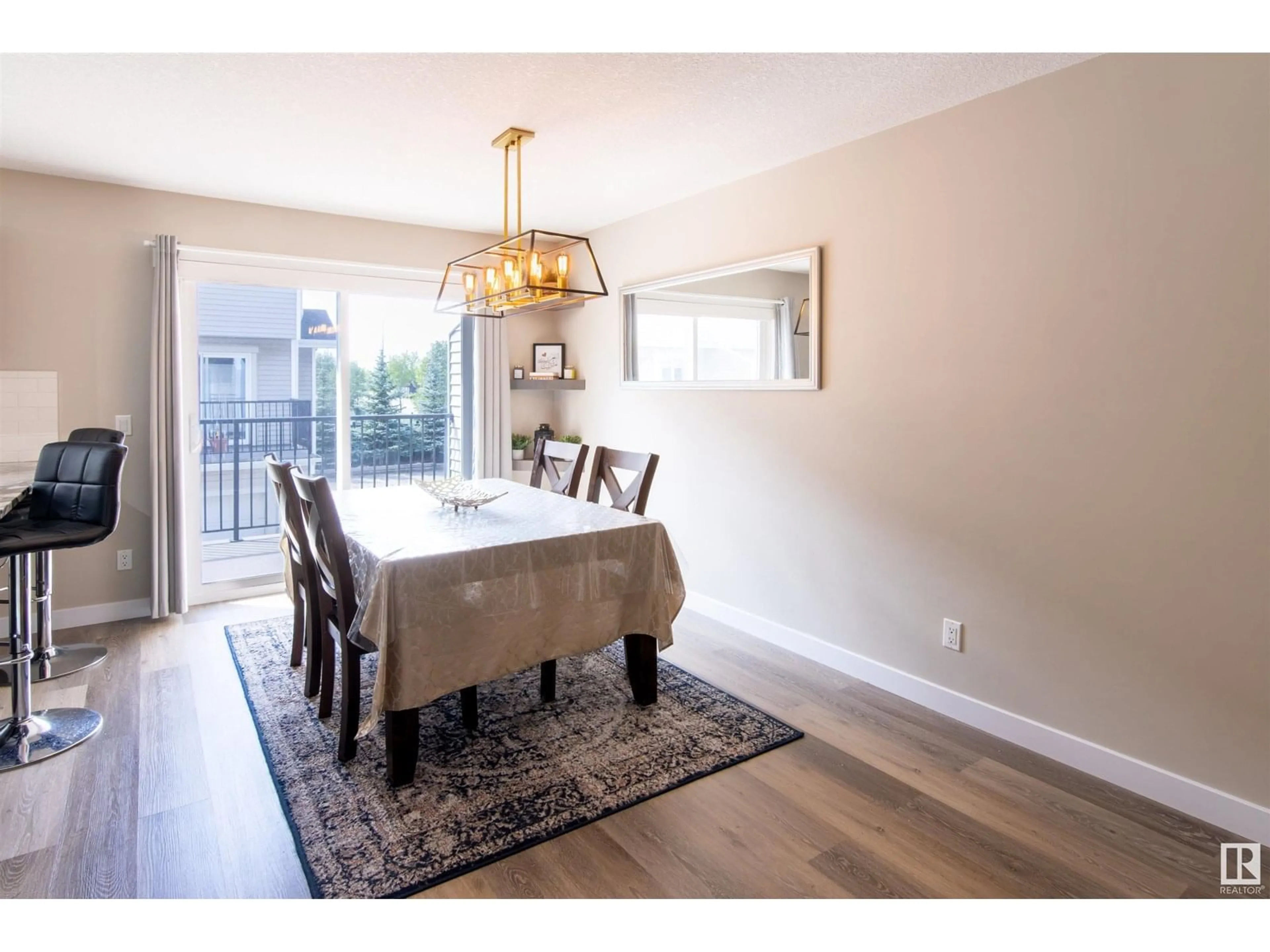 Dining room, wood/laminate floor for #11 - 13810 166 AV, Edmonton Alberta T6V0K4