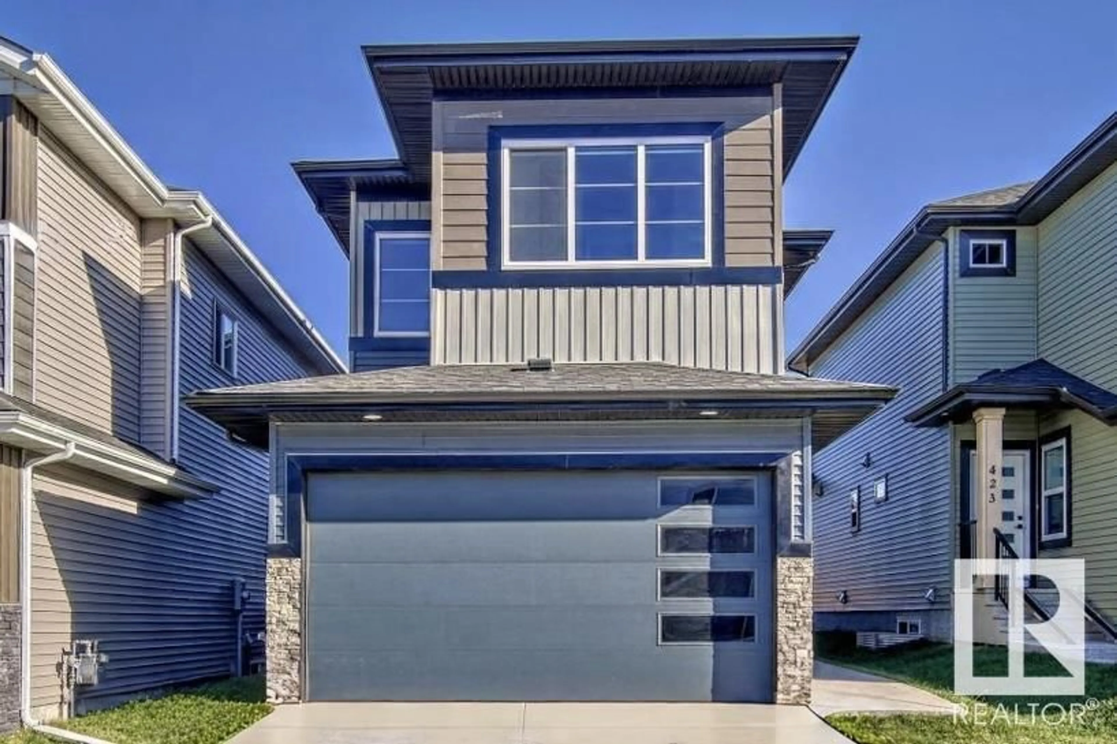 Home with vinyl exterior material, street for 8451 MAYDAY LINK SW, Edmonton Alberta T6X3E6