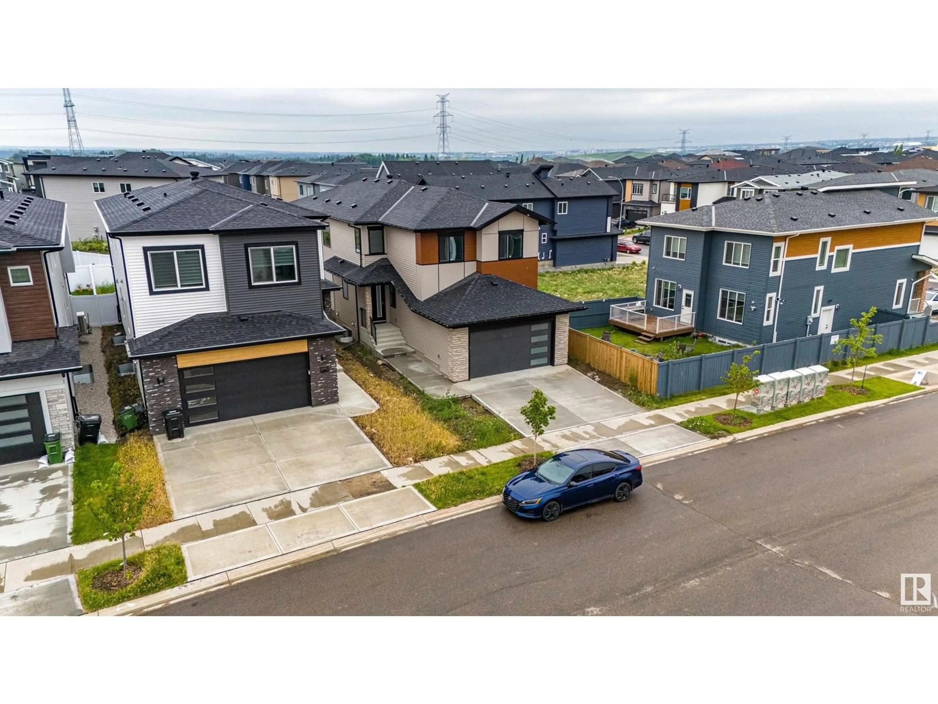 A pic from outside/outdoor area/front of a property/back of a property/a pic from drone, street for 205 FRASER WY, Edmonton Alberta T5Y4C1